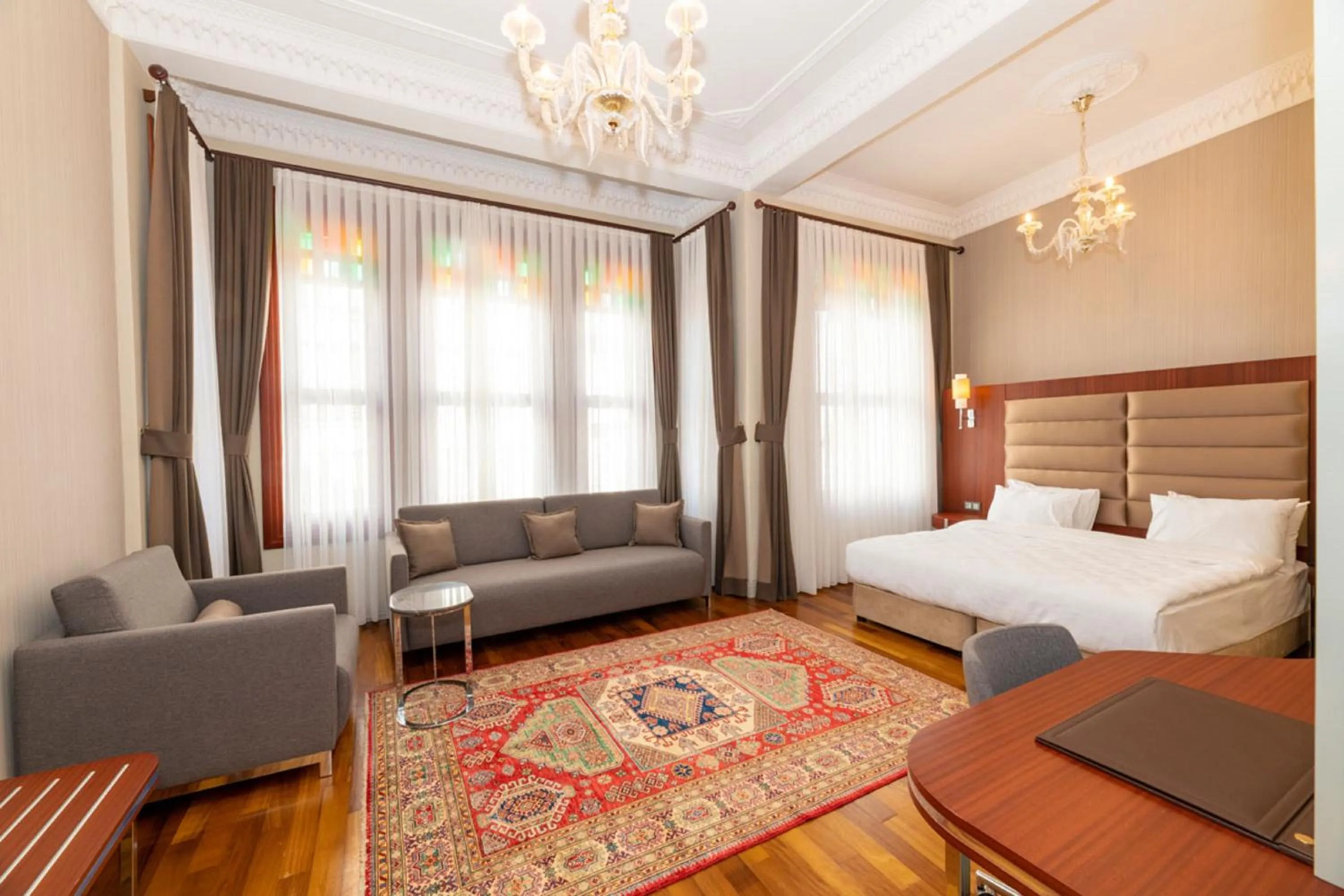 Bed in Blue Gilroy Hotel