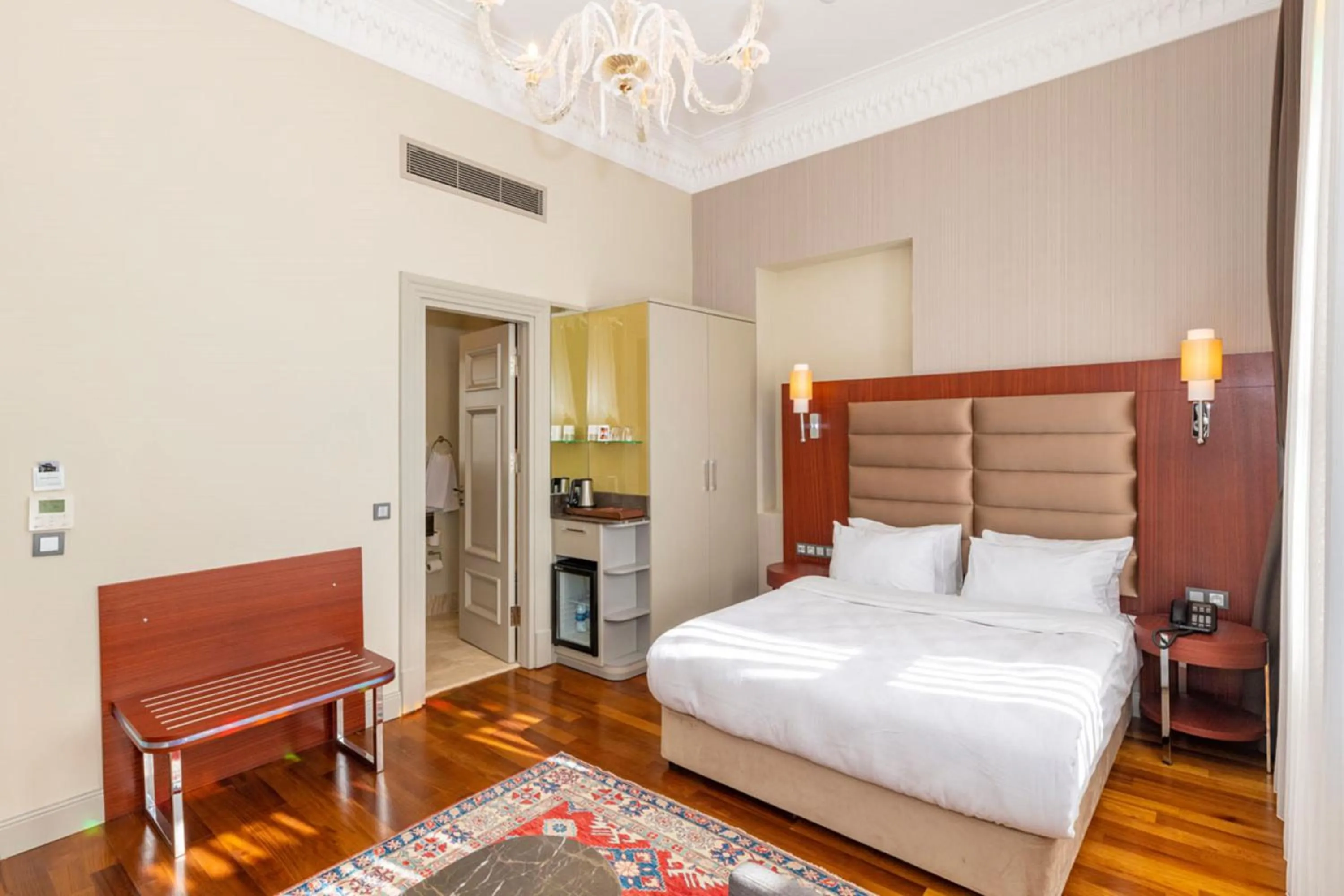 Bed in Blue Gilroy Hotel