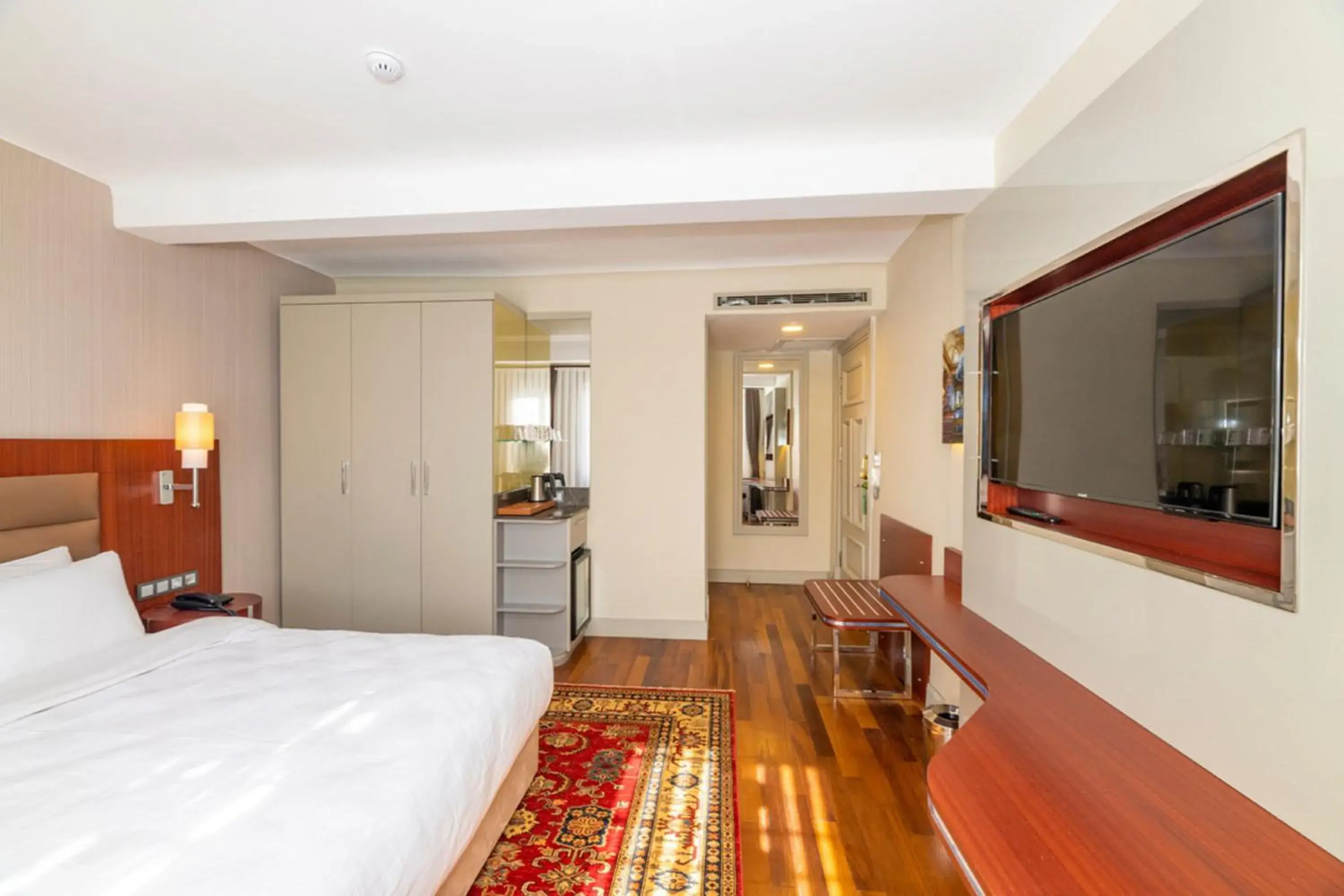 Bed in Blue Gilroy Hotel Bed in Blue Gilroy Hotel