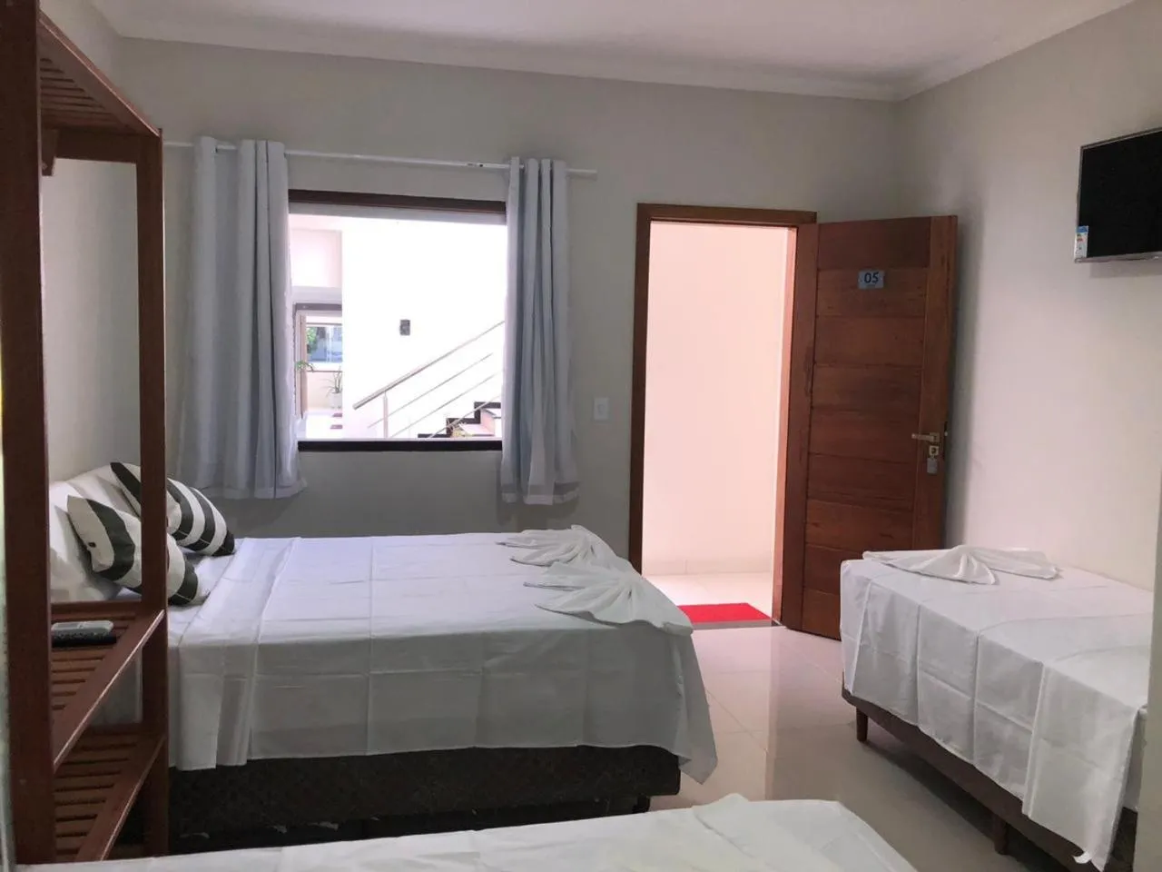 Bed in Pousada Veleiro
