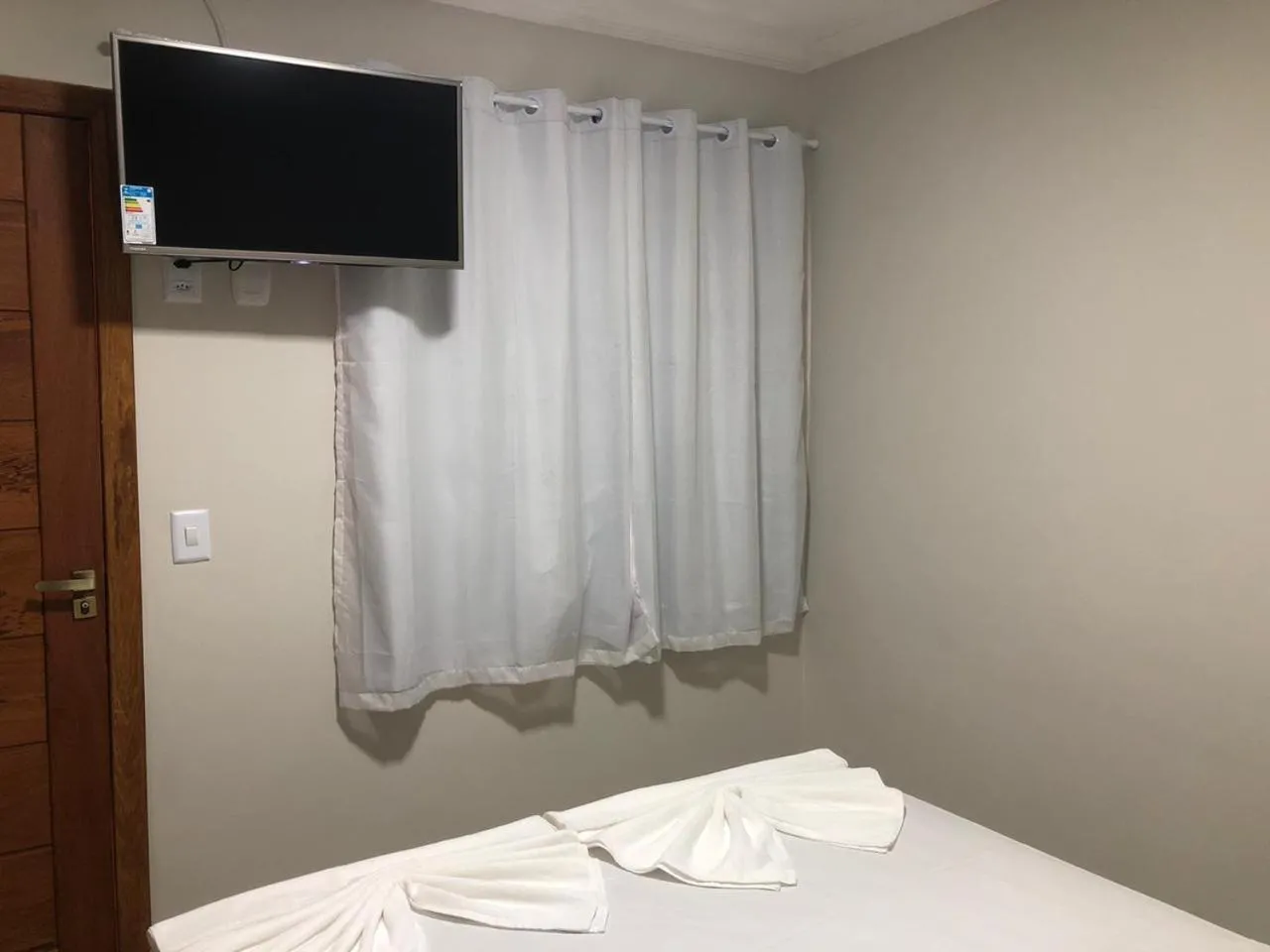 Bed in Pousada Veleiro