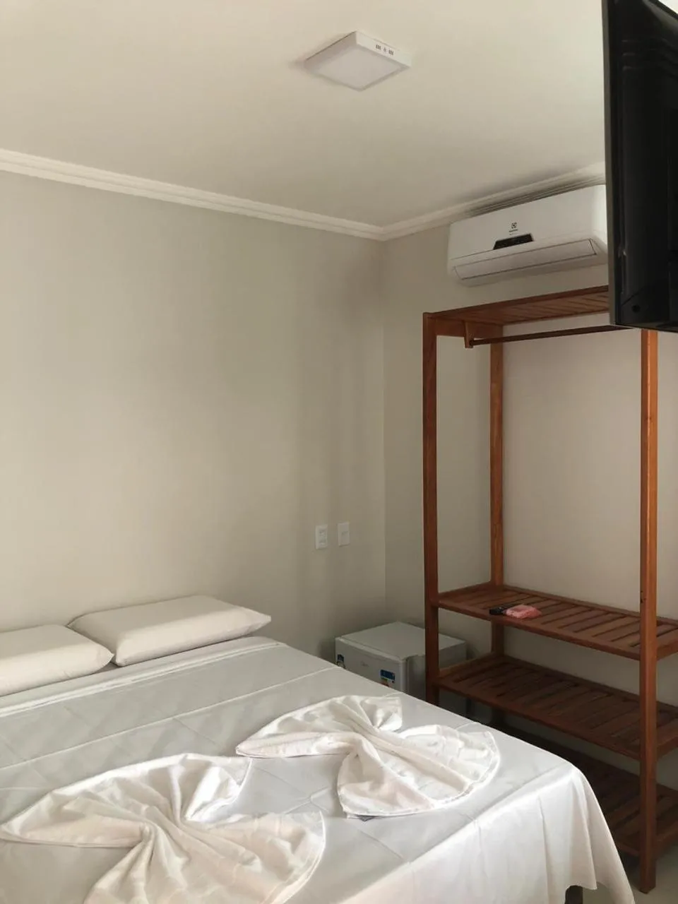 Bed in Pousada Veleiro