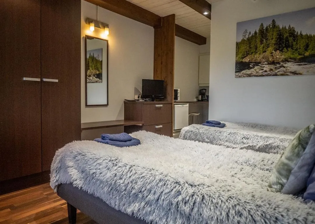 Photo of the whole room, Bed in Iisakki Village