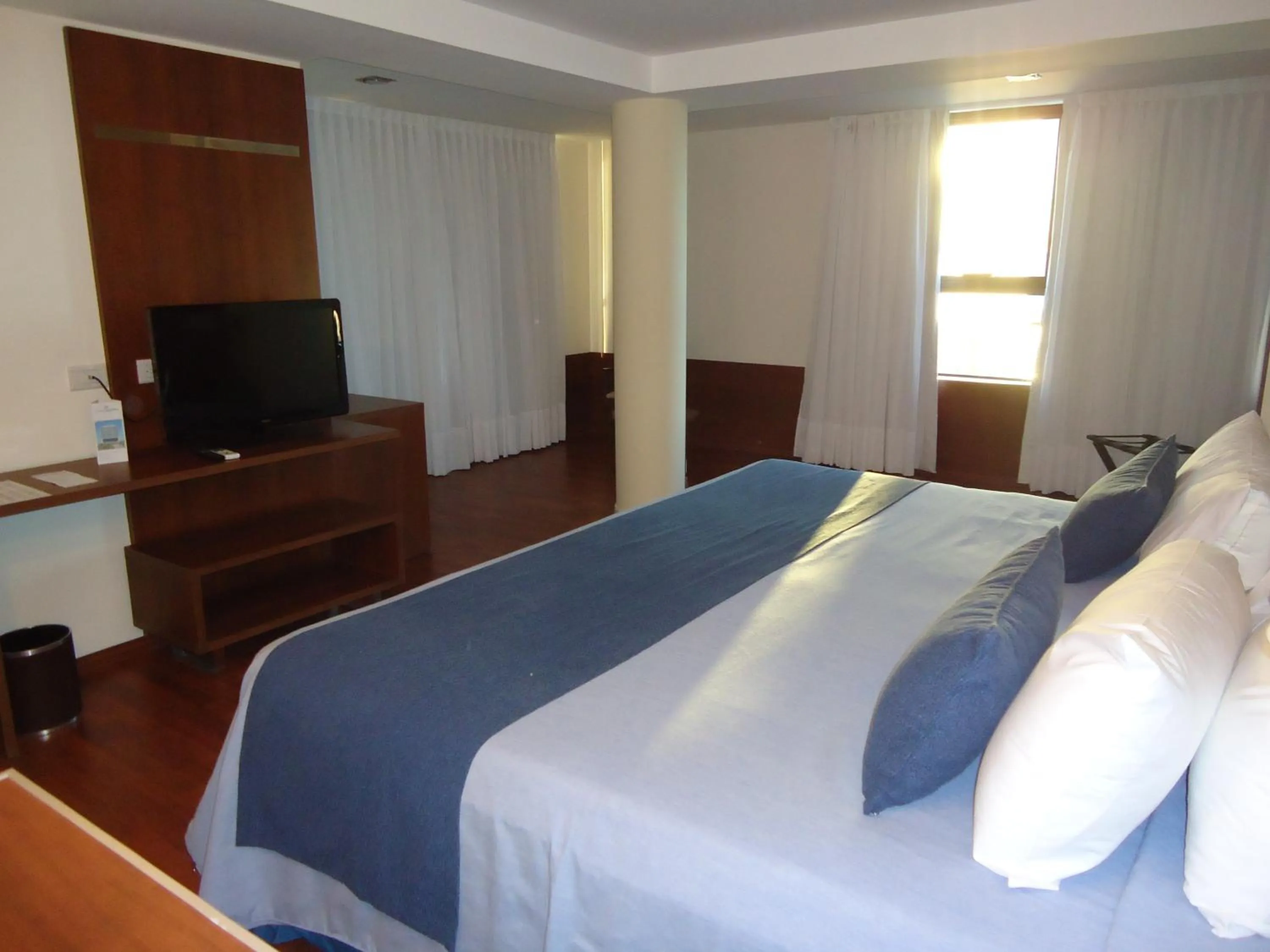 Bed in Puerto Amarras Hotel & Suites