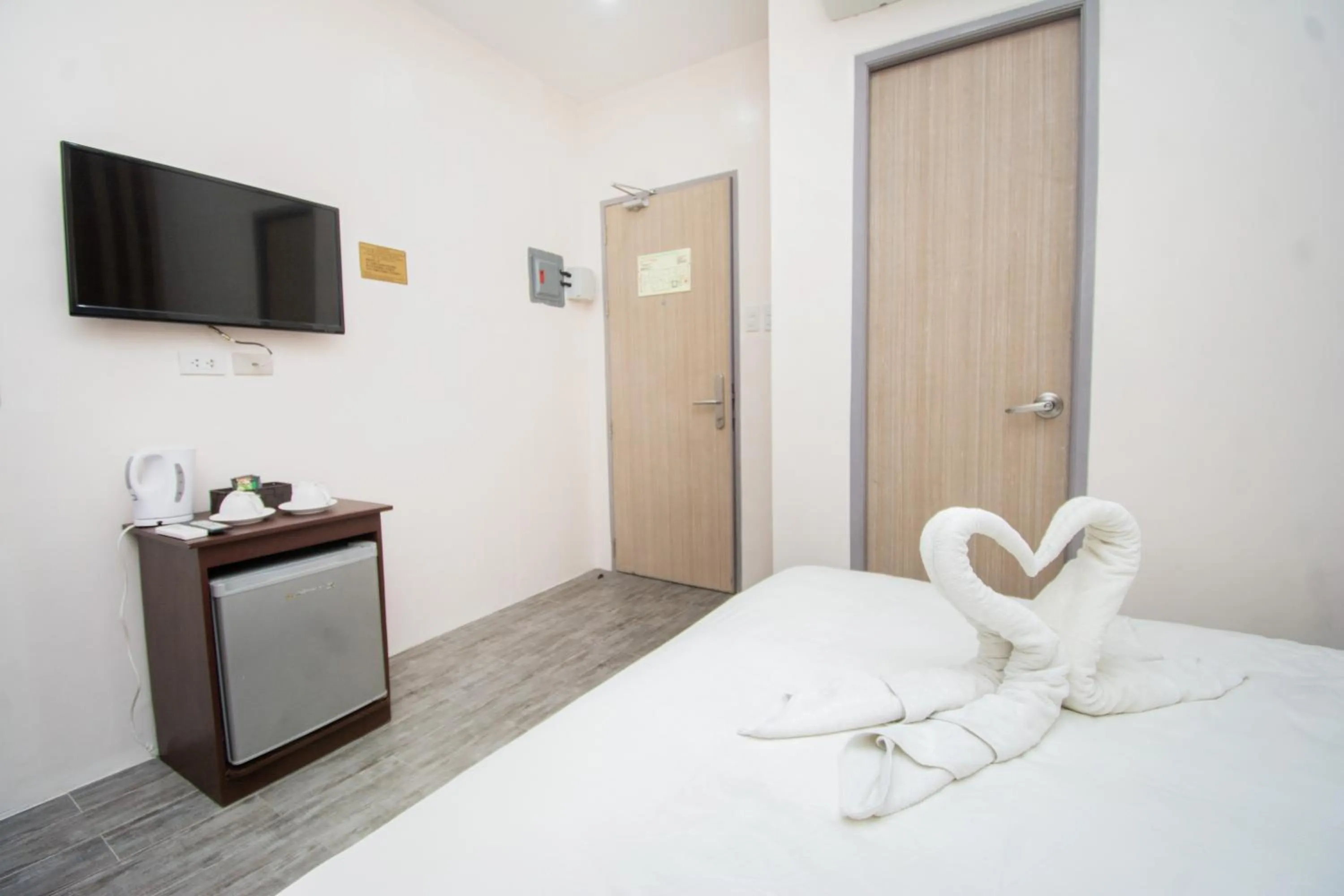 Bed in Emerald Island Hotel