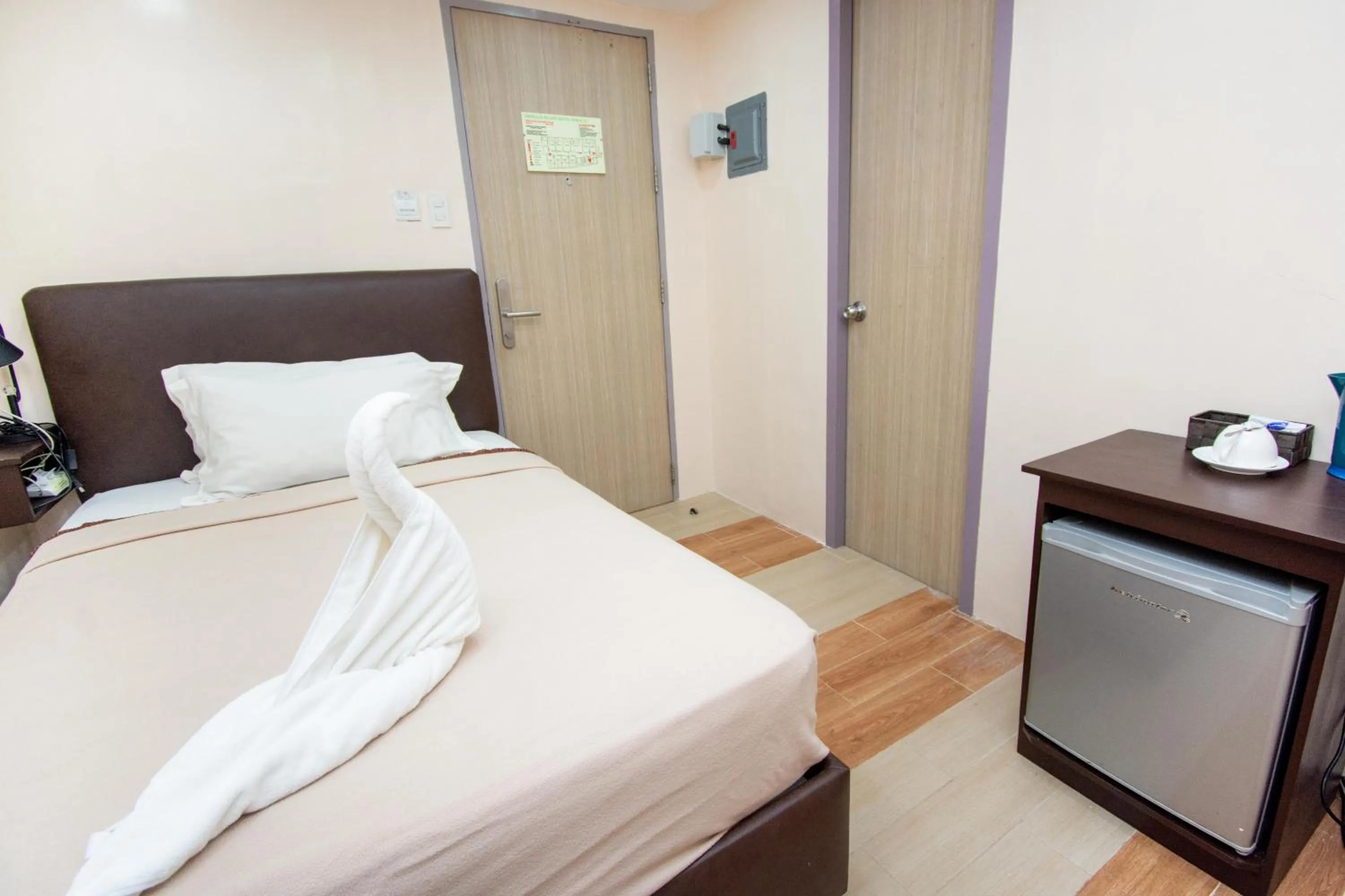 Bed in Emerald Island Hotel