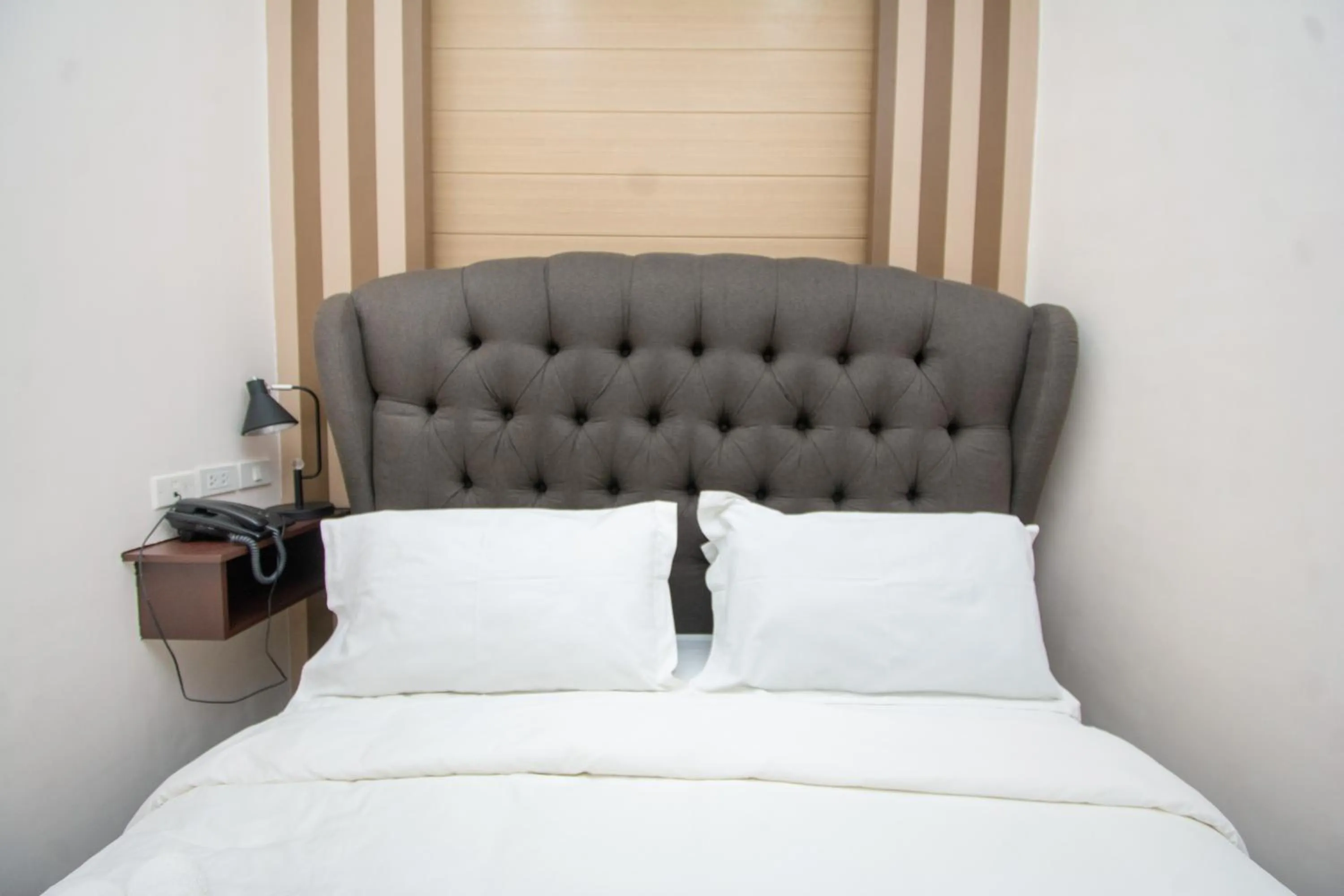 Bed in Emerald Island Hotel