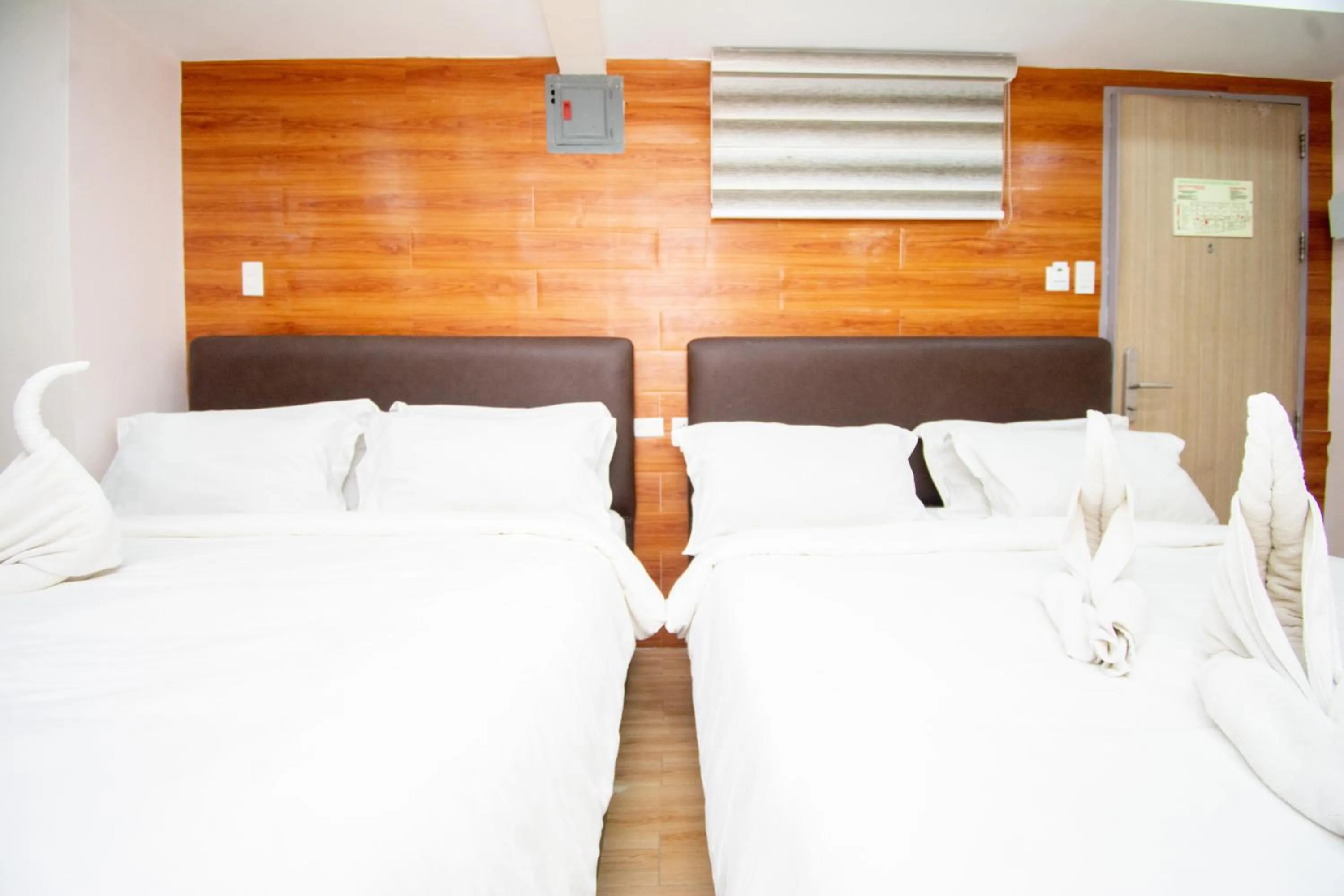 Bed in Emerald Island Hotel