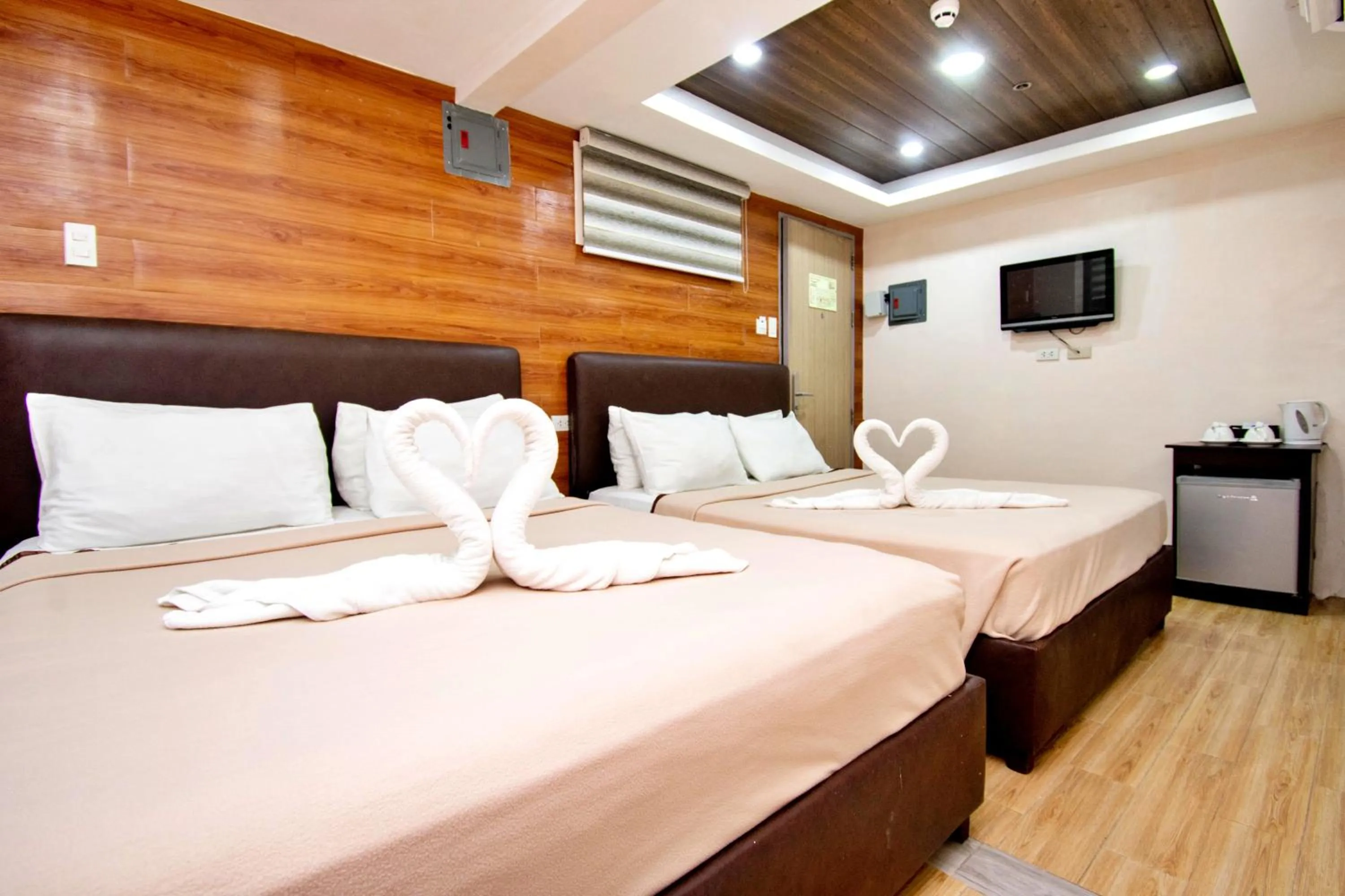 Bed in Emerald Island Hotel