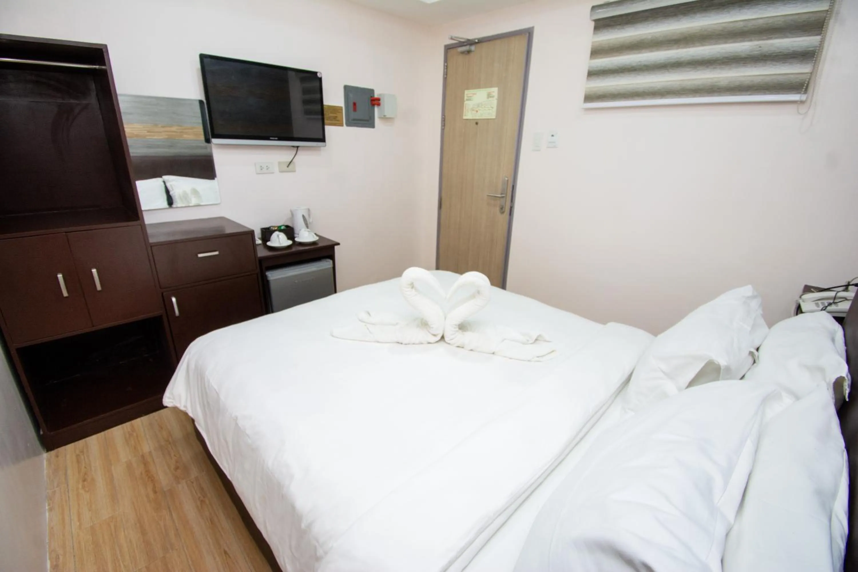 Bed in Emerald Island Hotel