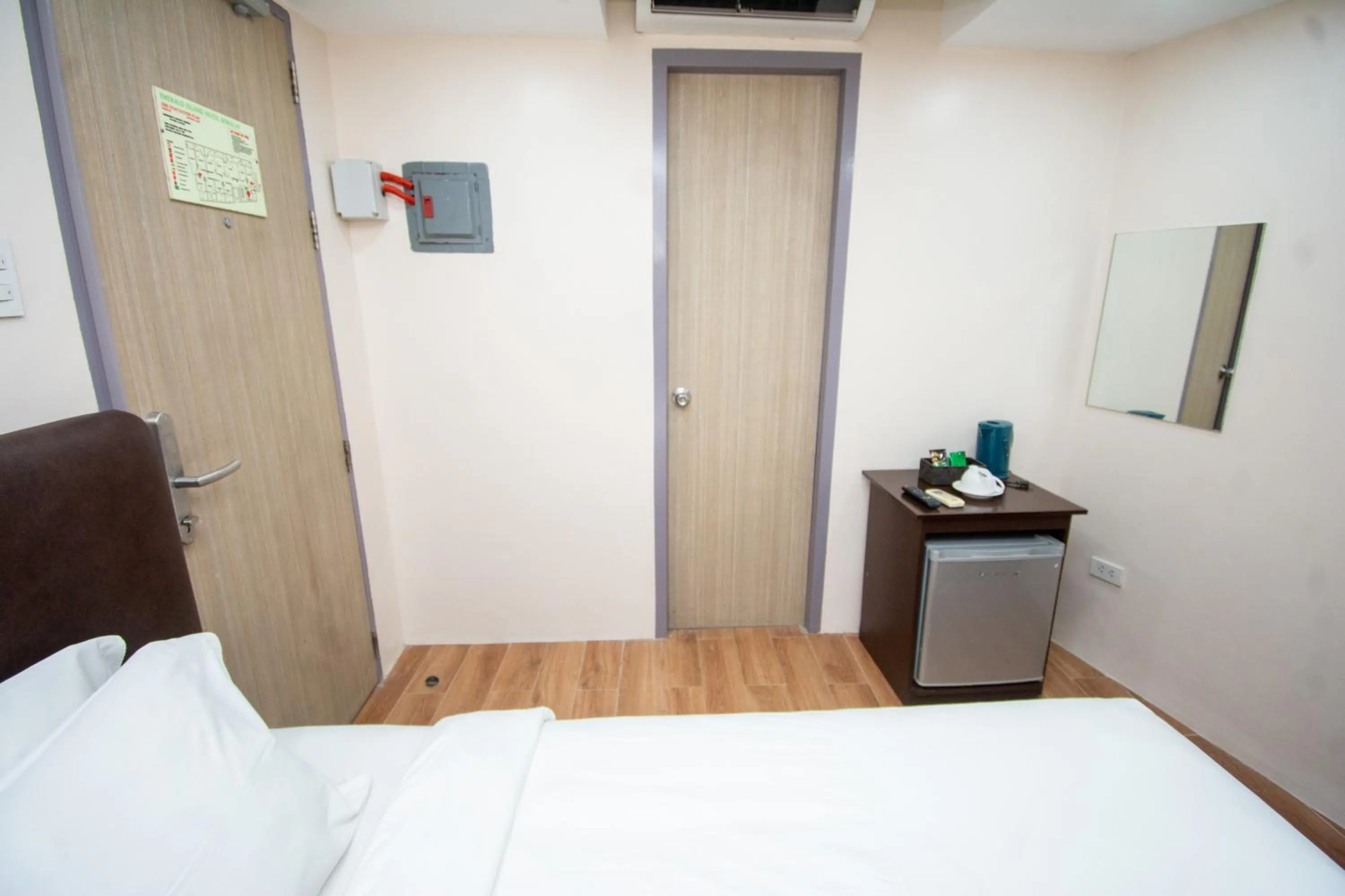 Bed in Emerald Island Hotel