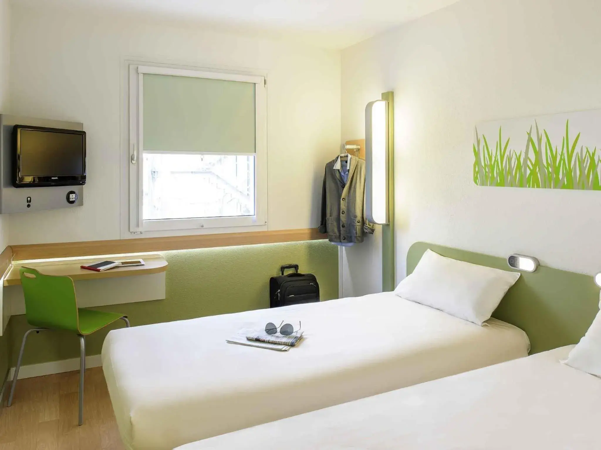Bedroom, Bed in ibis budget Lyon Sud St Genis Laval Bedroom, Bed in ibis budget Lyon Sud St Genis Laval