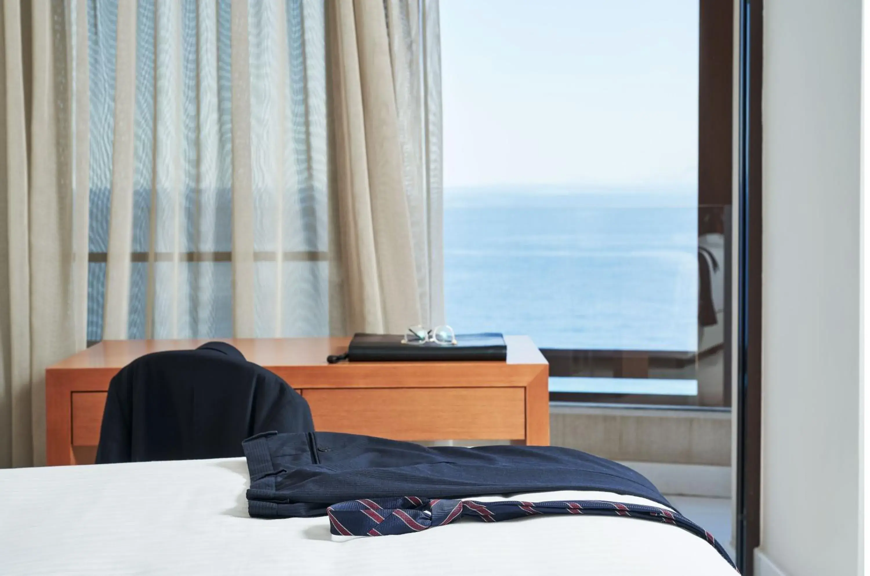 Business facilities, Bed in Bellevue On The Beach Suites Business facilities, Bed in Bellevue On The Beach Suites