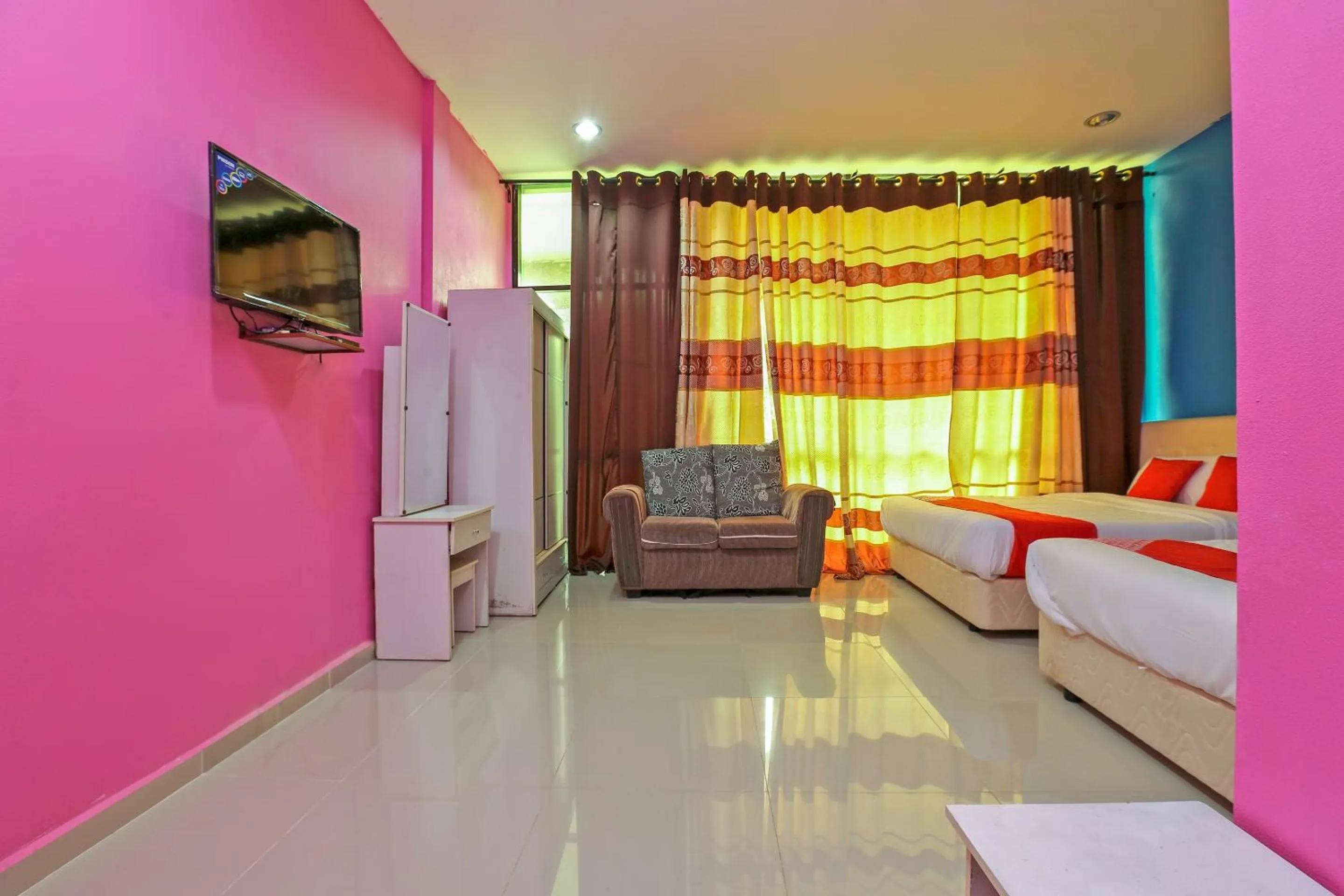 Bedroom in OYO 89933 Nun Hotel