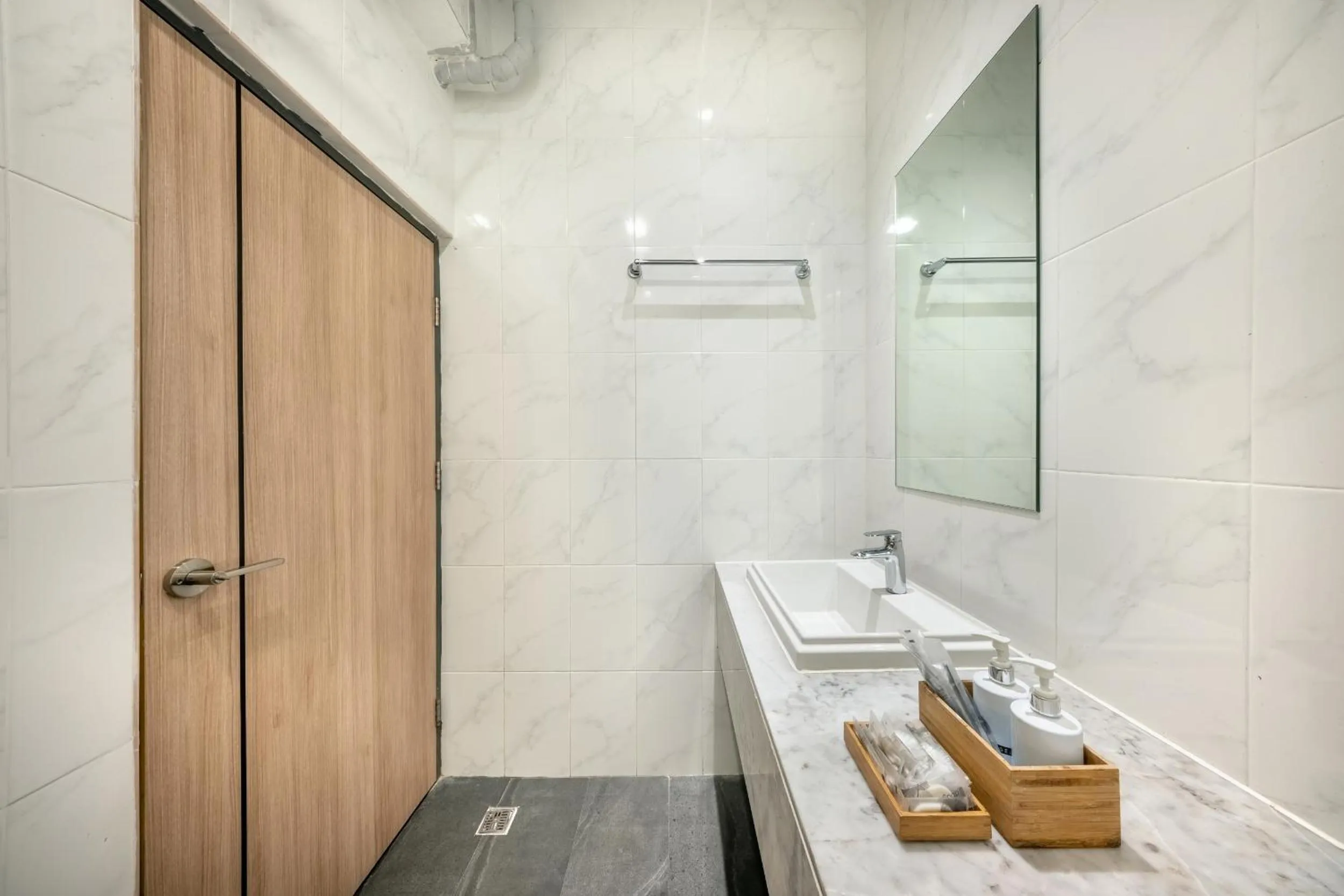 Bathroom in SHIN Arch39 Phuket Beach Front - SHA Plus