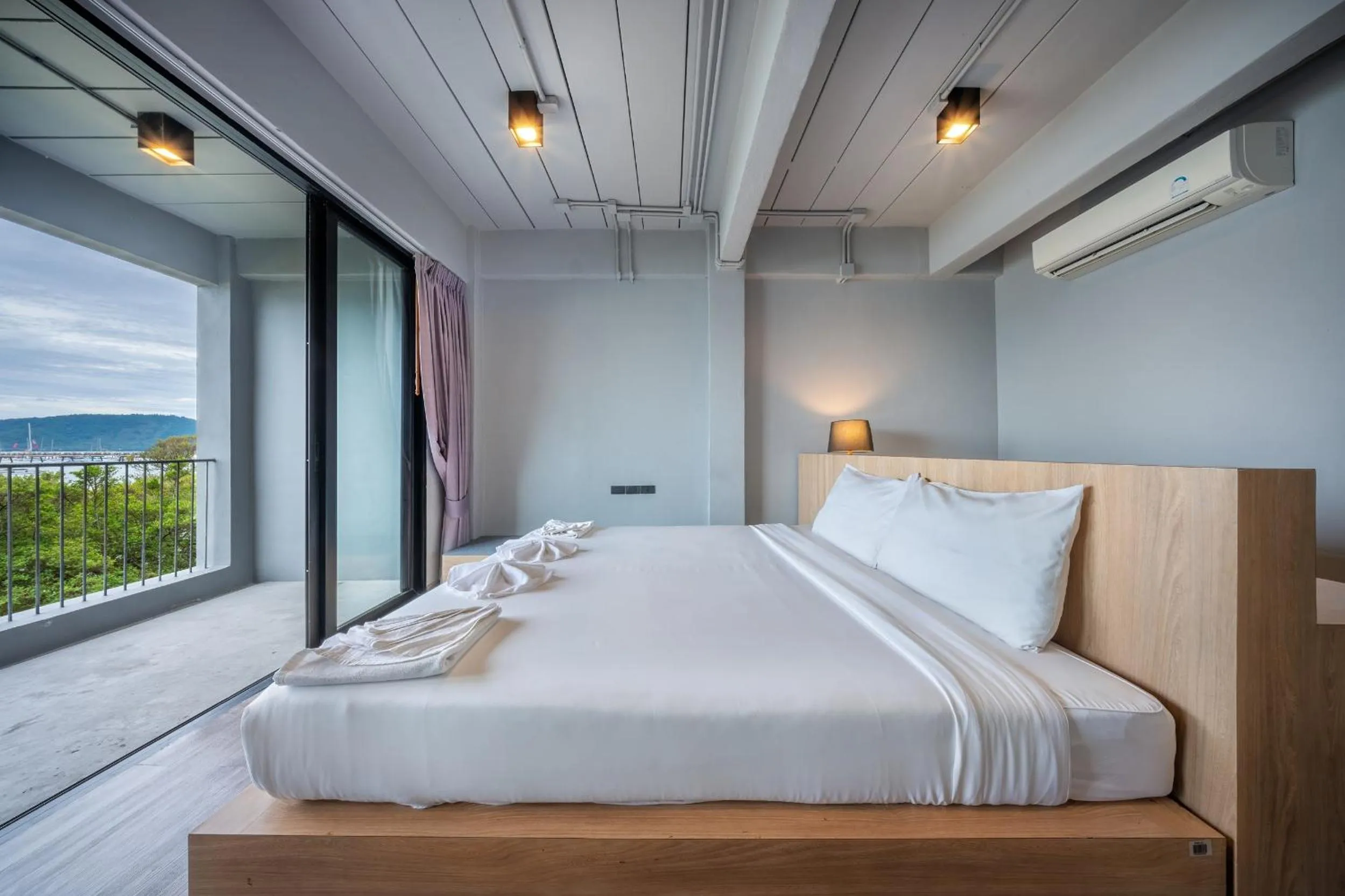 Bed in SHIN Arch39 Phuket Beach Front - SHA Plus