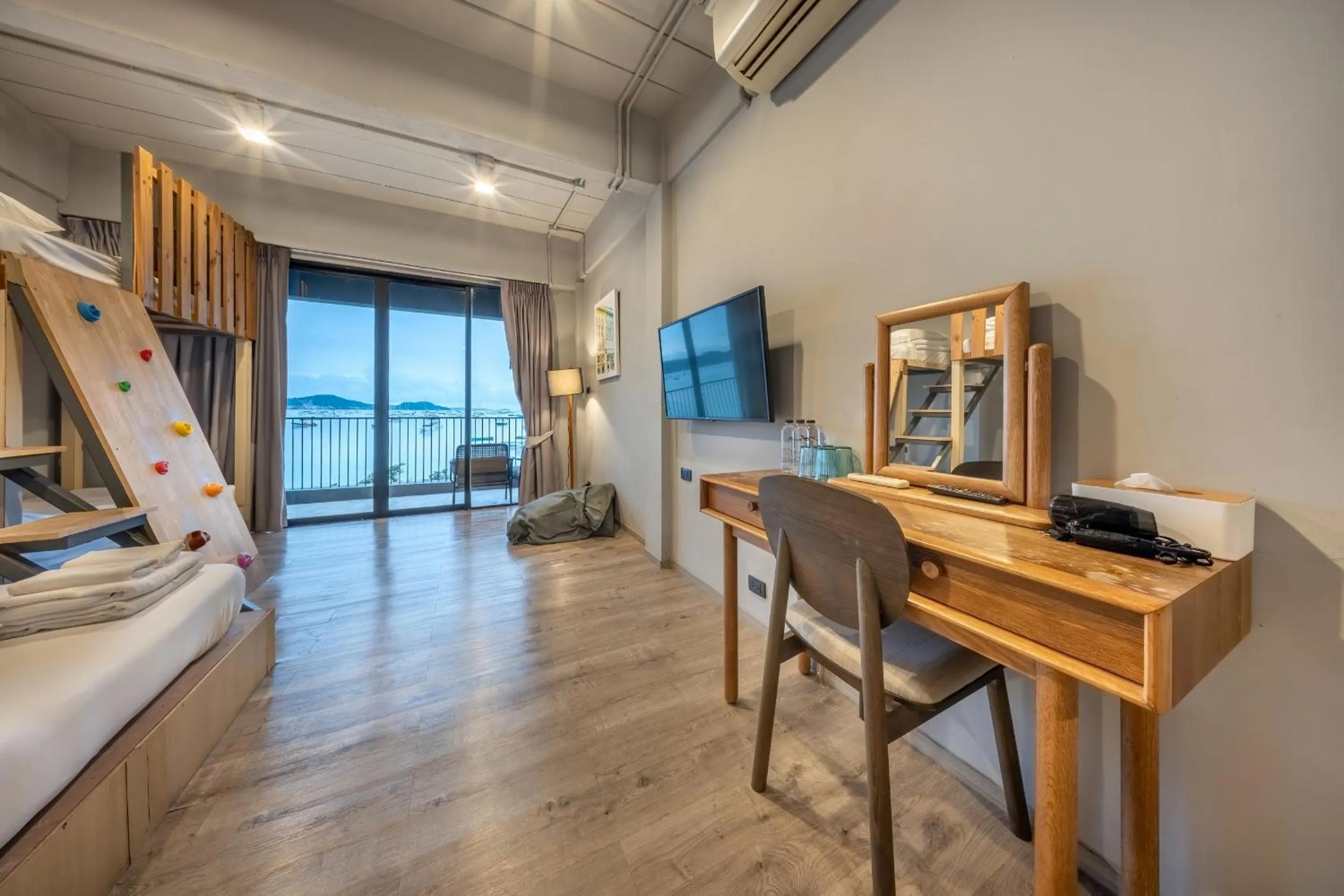 Photo of the whole room in SHIN Arch39 Phuket Beach Front - SHA Plus