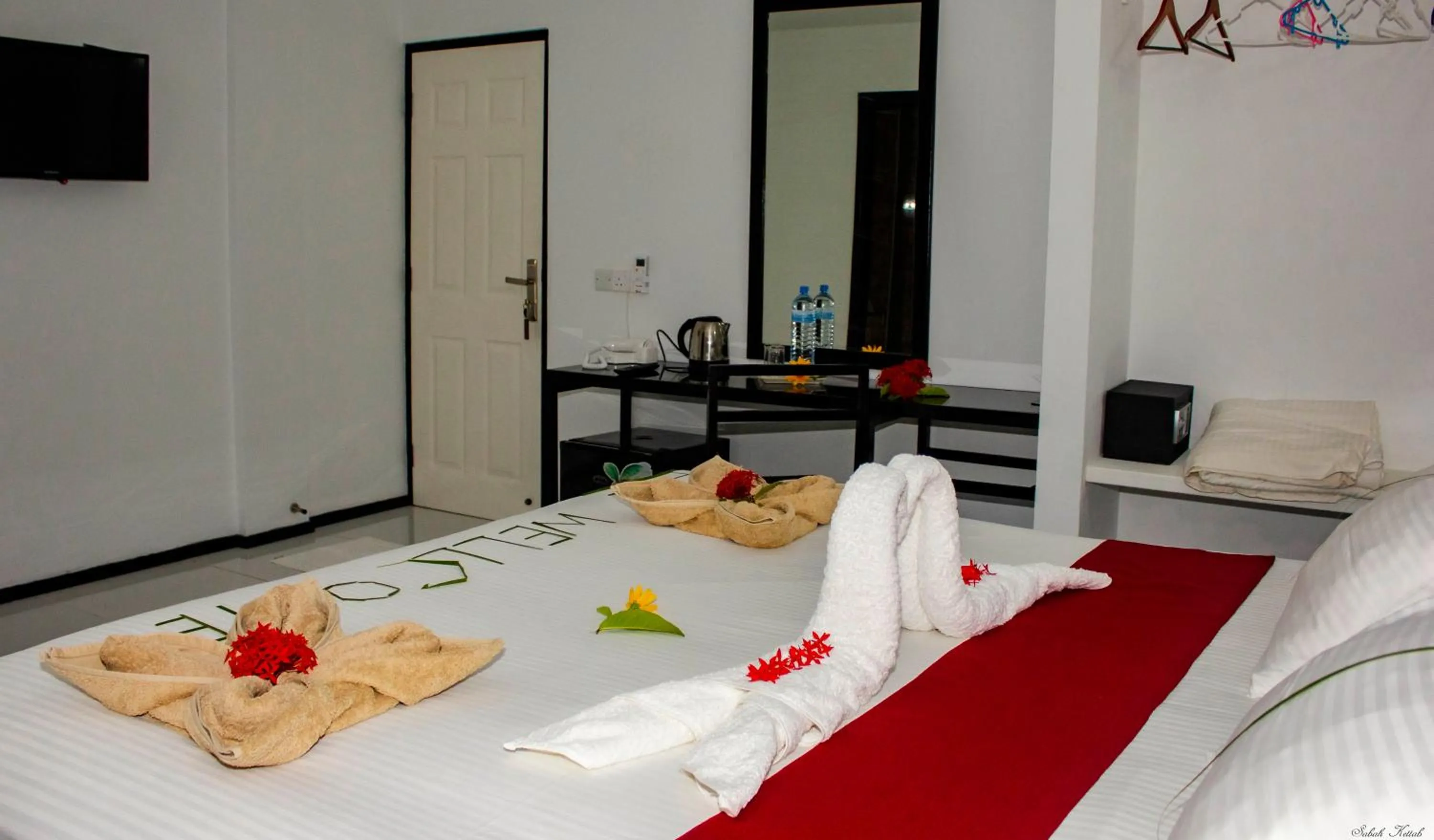 Bed in Crown Beach Villas -Private Beach