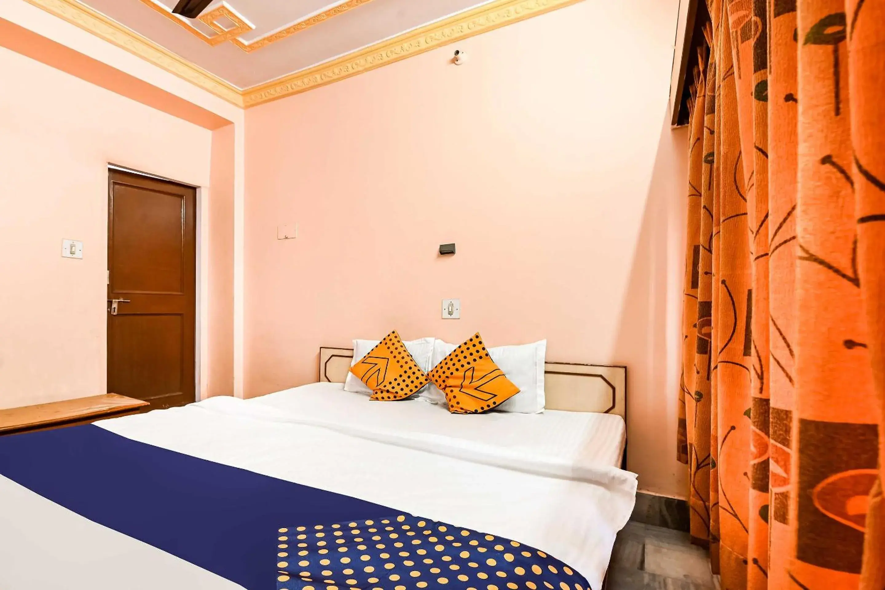 Bedroom in SPOT ON Hotel Pink Sun Bedroom in SPOT ON Hotel Pink Sun