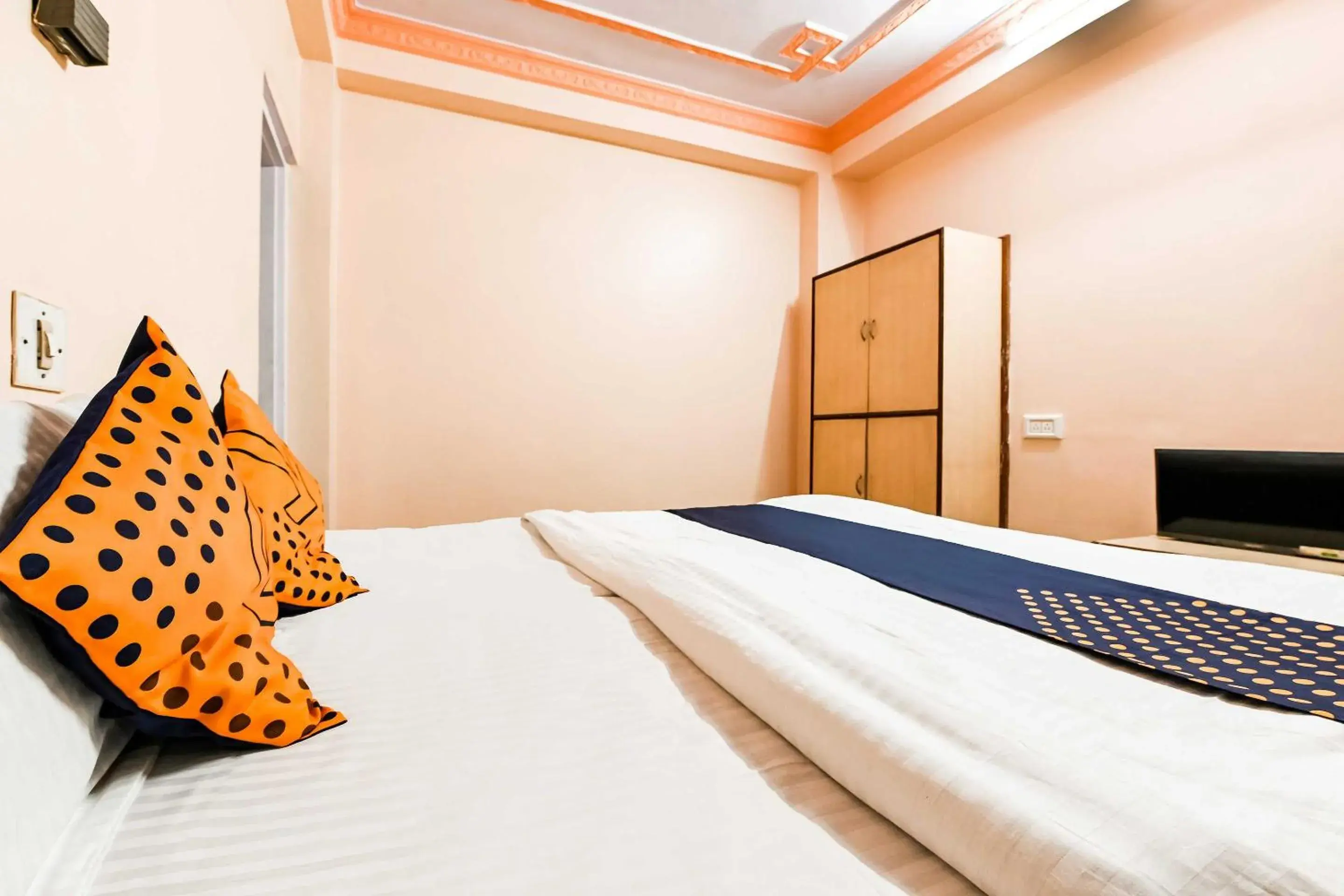 Bedroom in SPOT ON Hotel Pink Sun Bedroom in SPOT ON Hotel Pink Sun