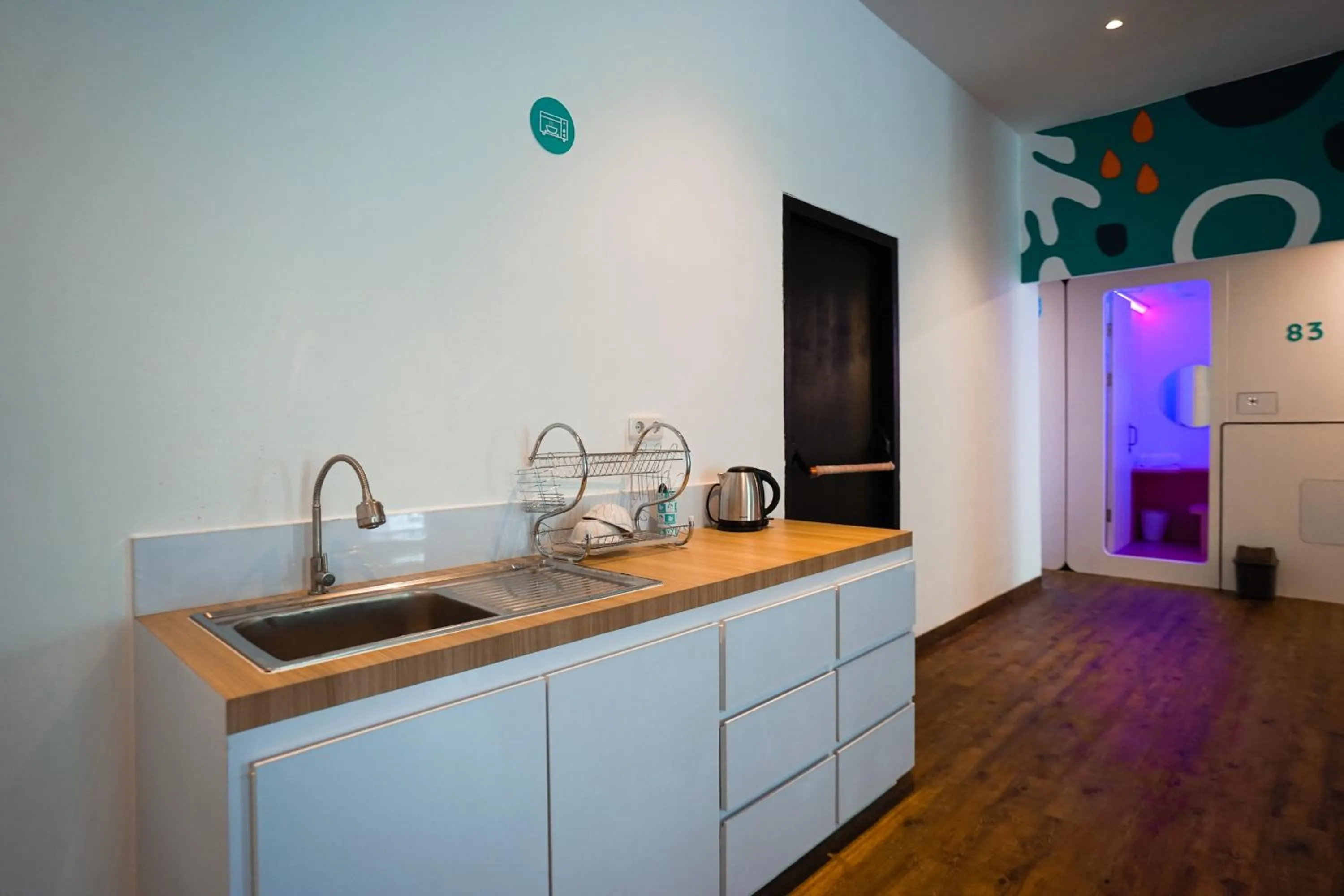 Communal kitchen in Bobopod Juanda, Jakarta