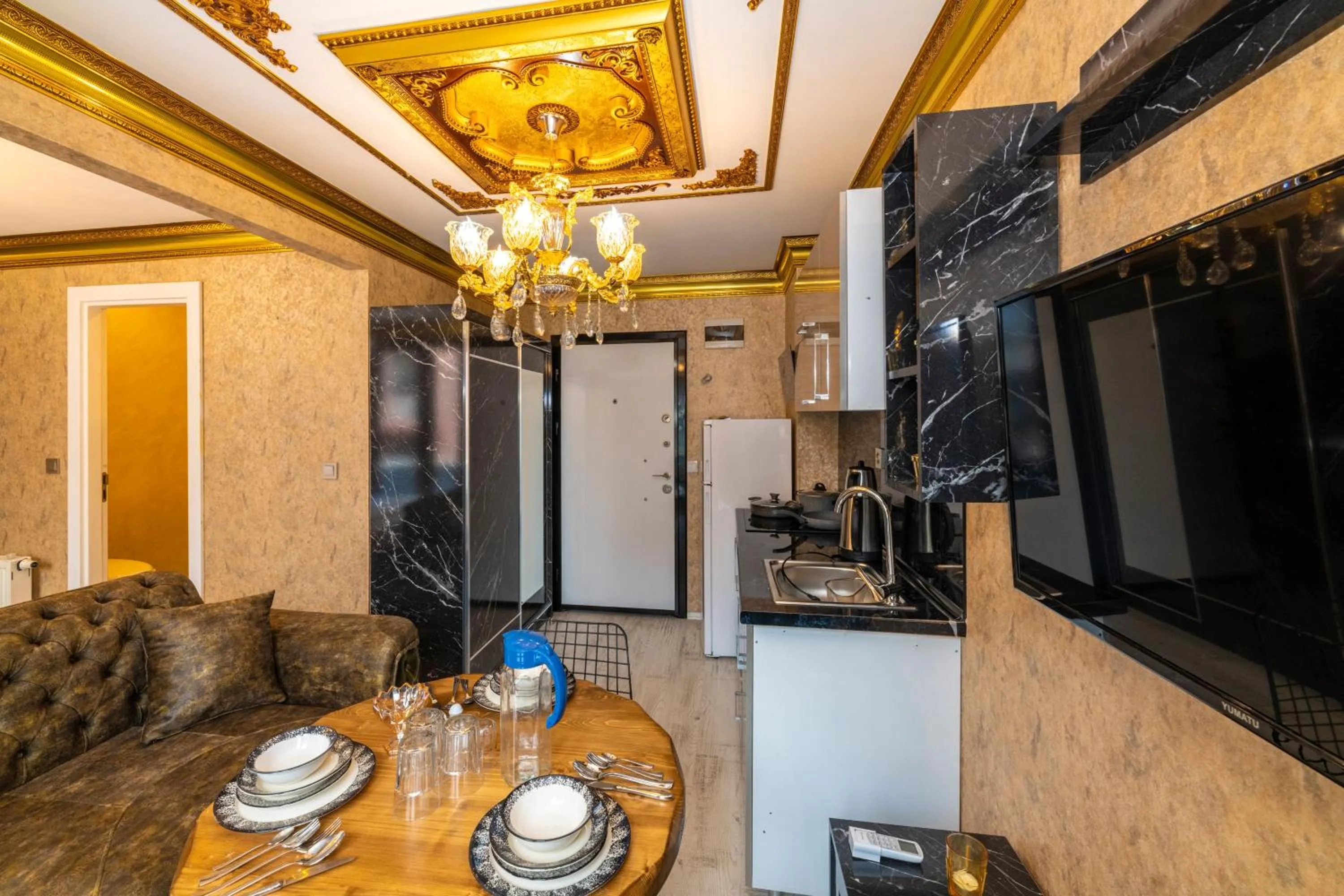 Kitchen or kitchenette in Istanbul Taksim Residence Hotel By MESUT