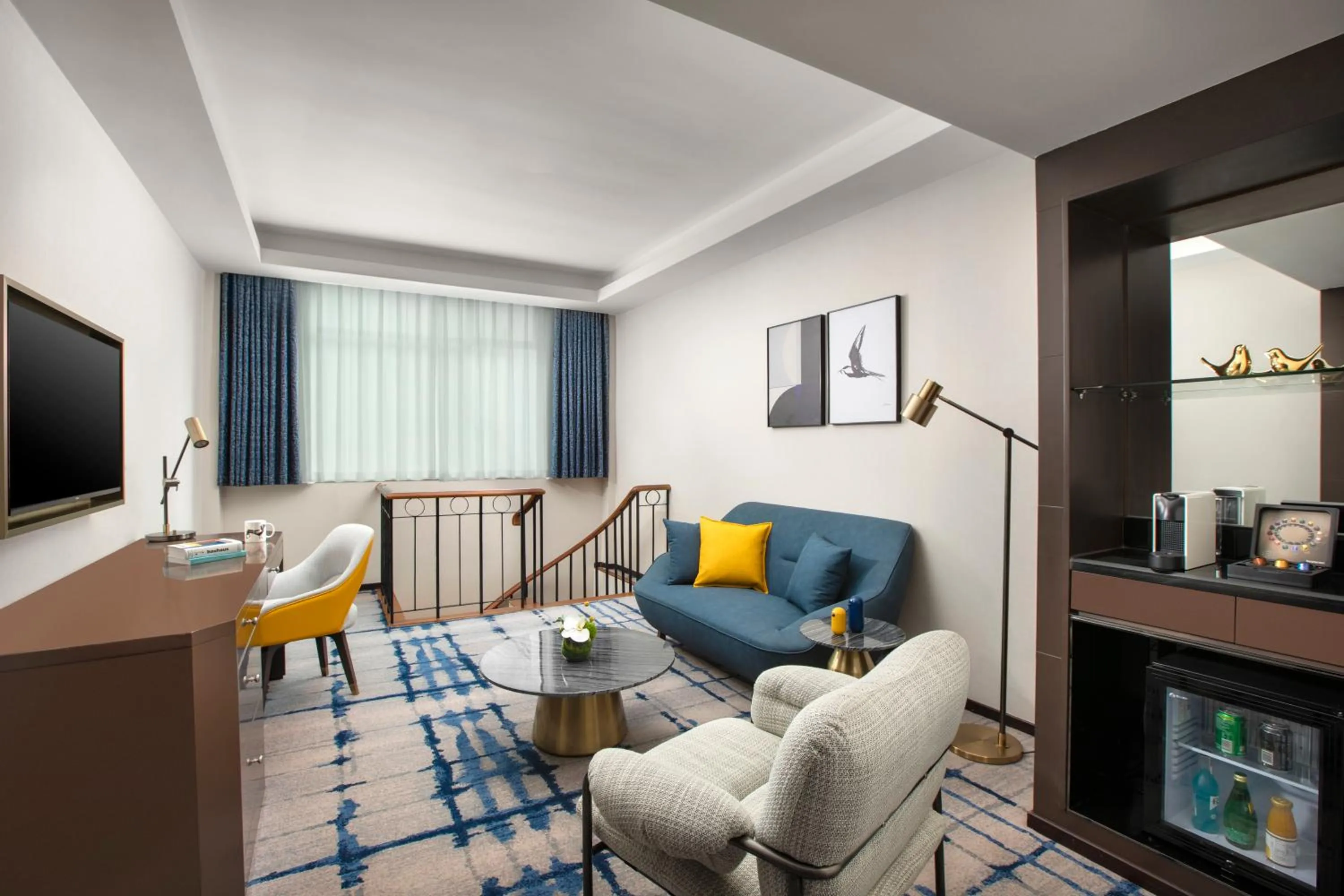 Living room in voco Wuhan Xinhua by IHG