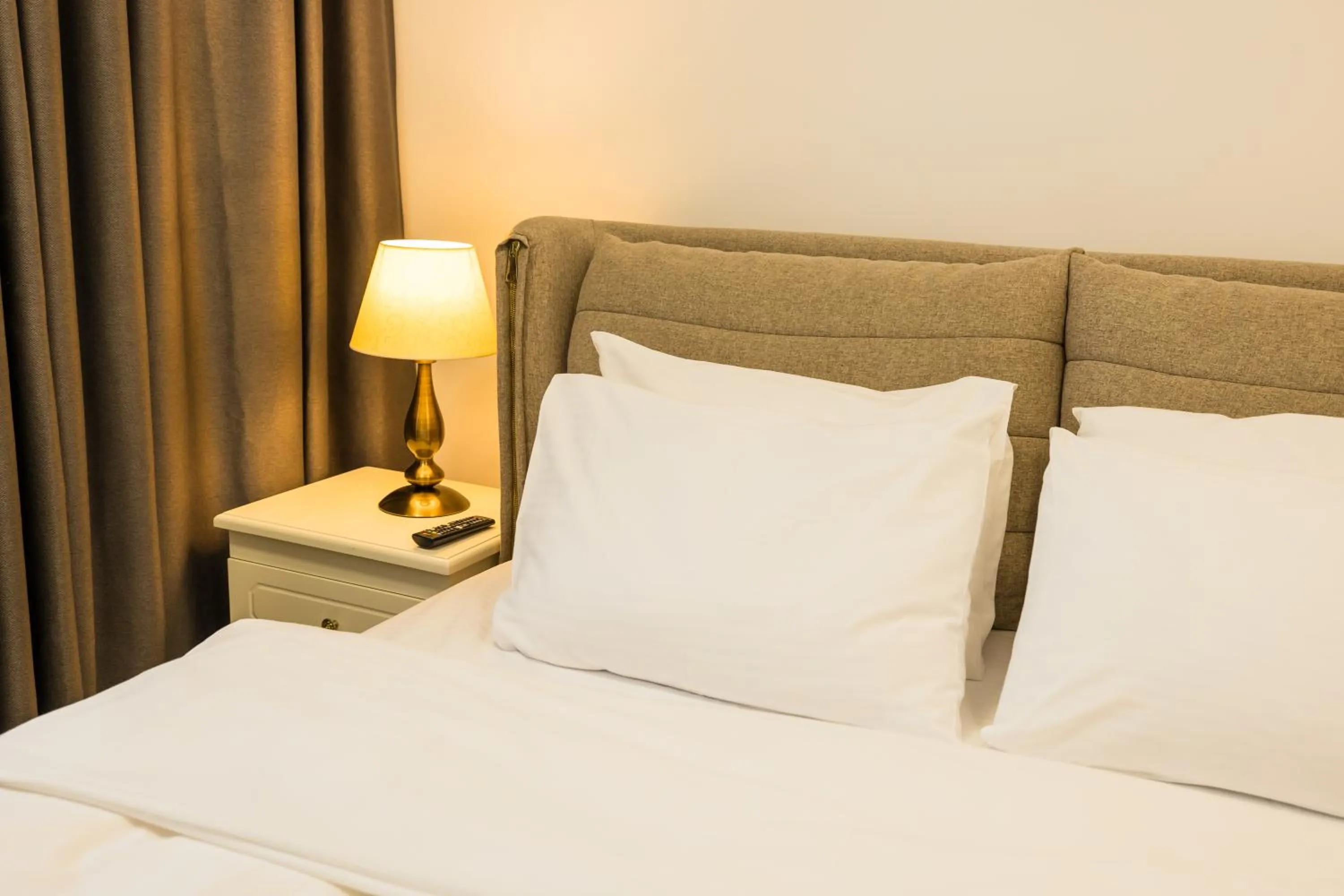 Bed in Le Blanc ApartHotel