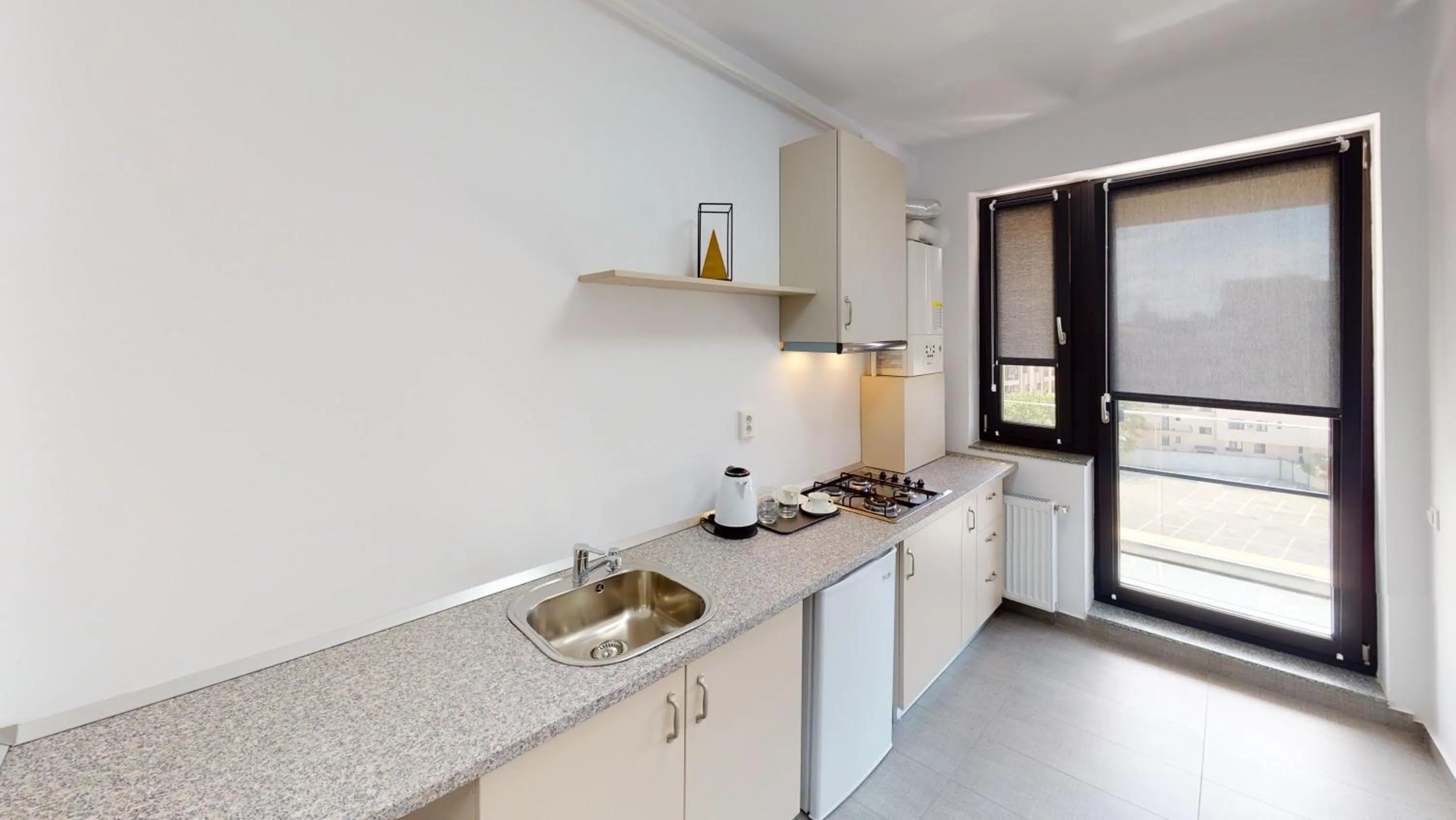 Kitchen or kitchenette in Le Blanc ApartHotel