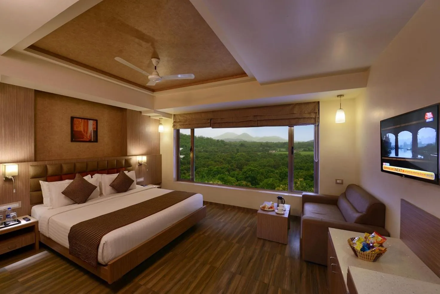 Photo of the whole room, Bed in Sarovar Portico Sasangir