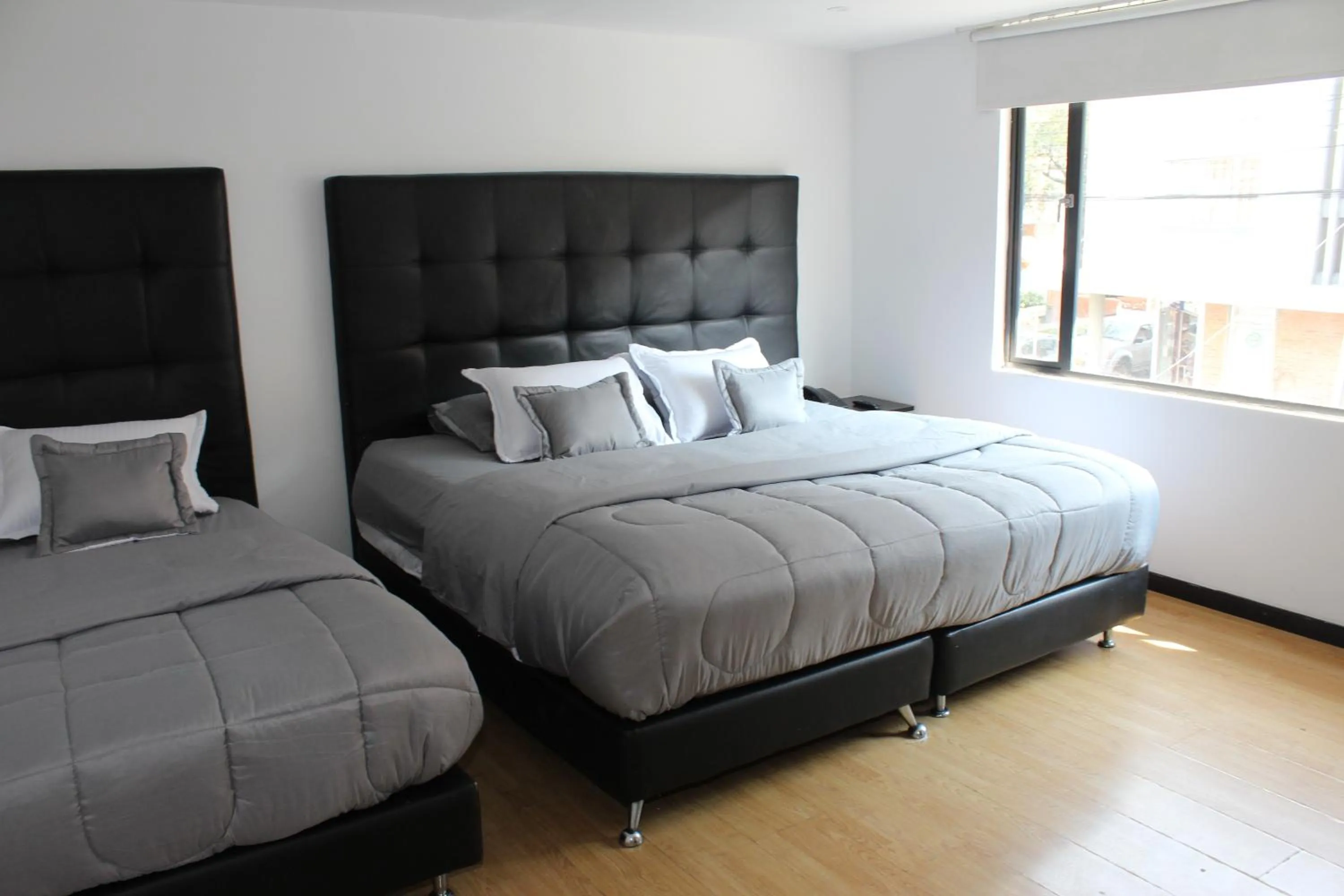 Bed in Hotel Montecarlo Boutique