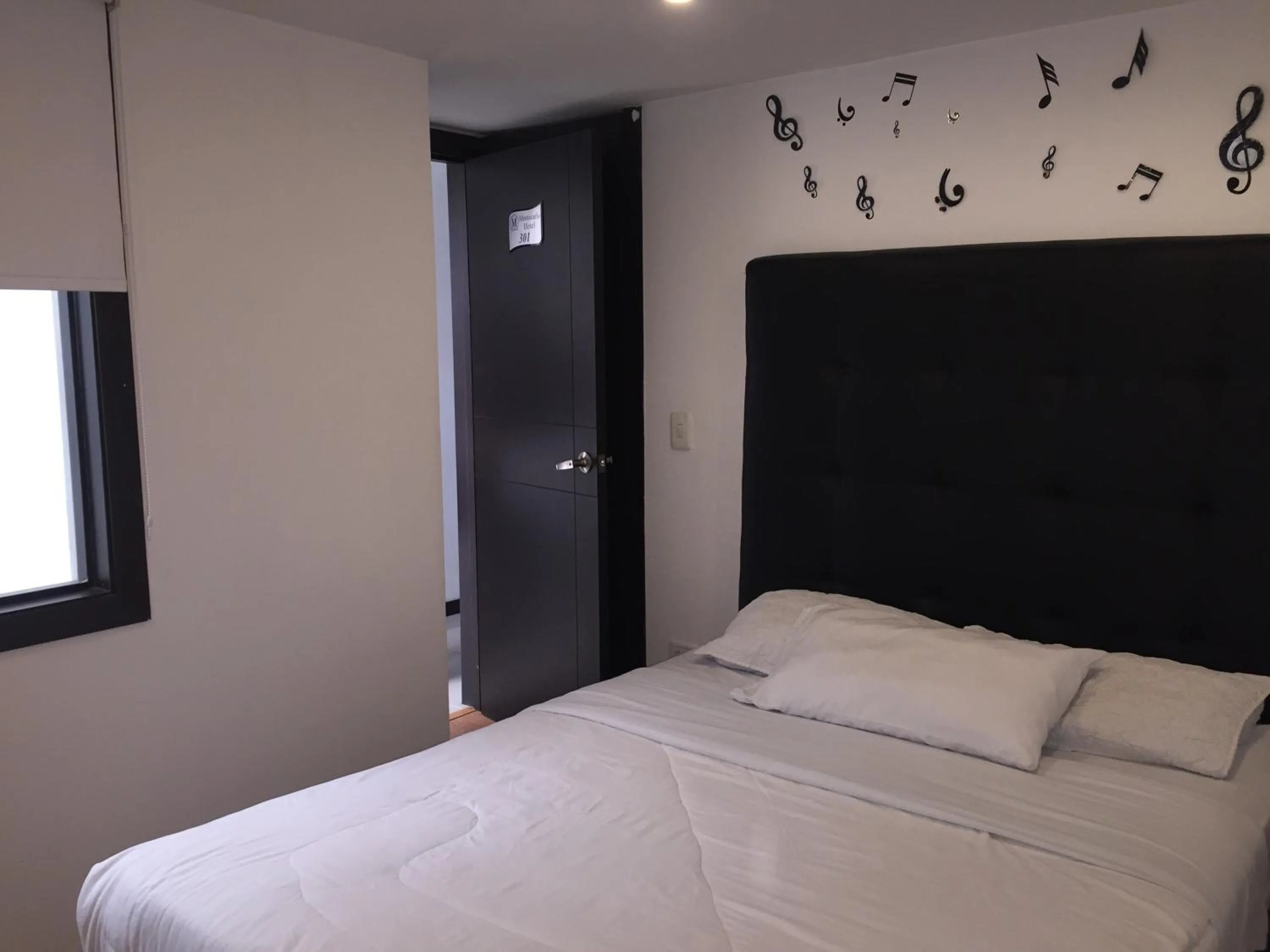 Bed in Hotel Montecarlo Boutique