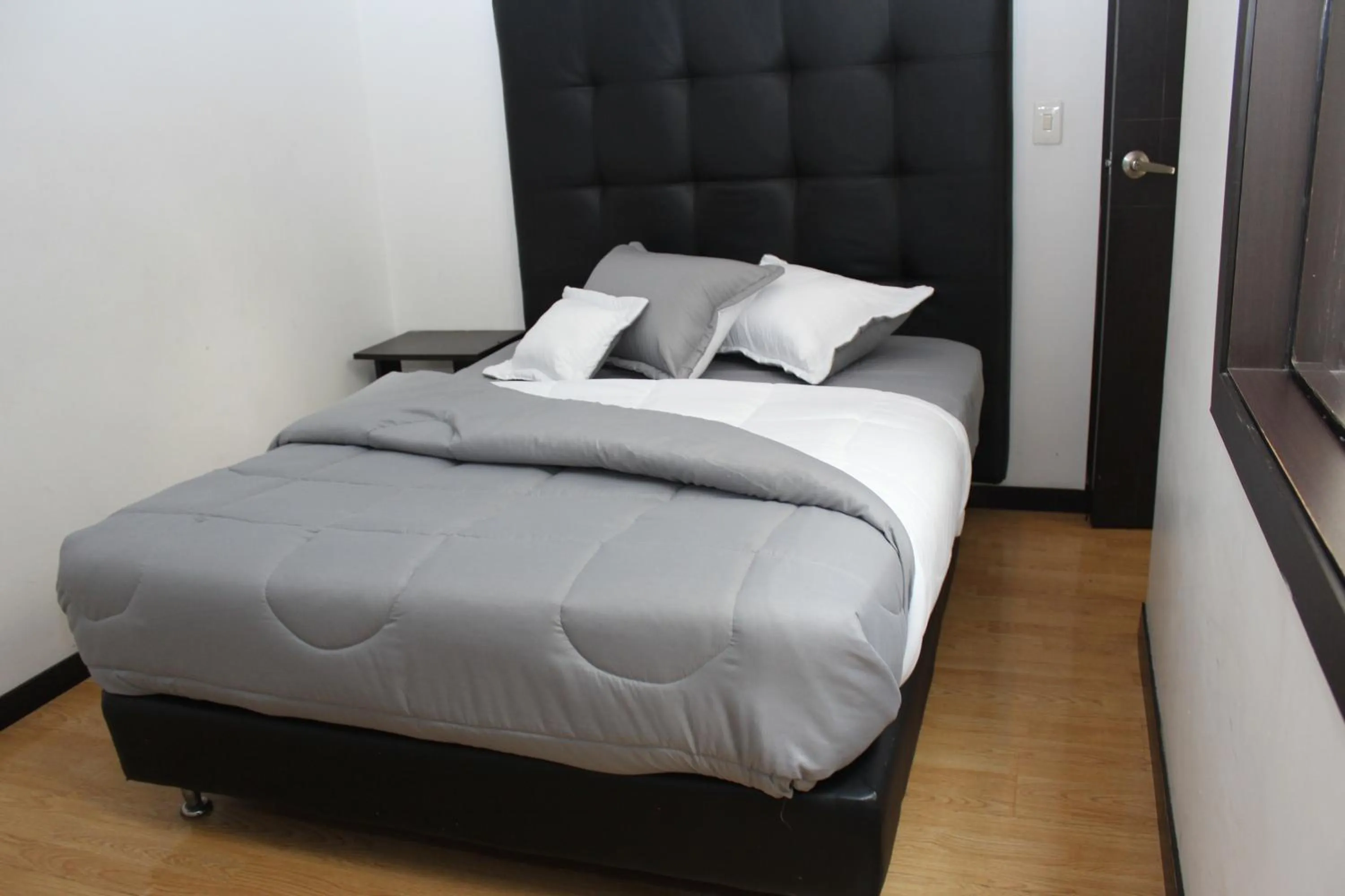 Bed in Hotel Montecarlo Boutique