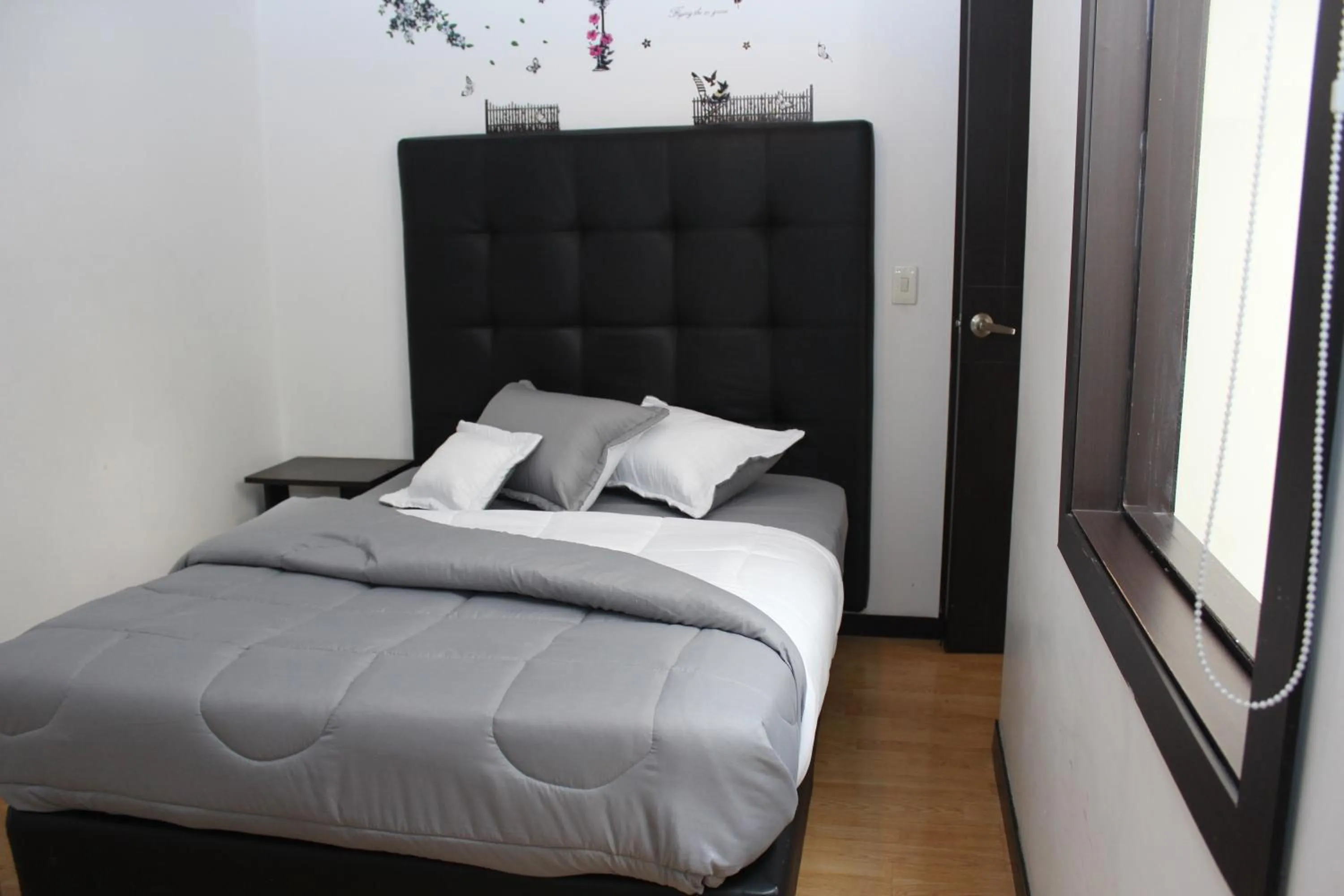 Bed in Hotel Montecarlo Boutique