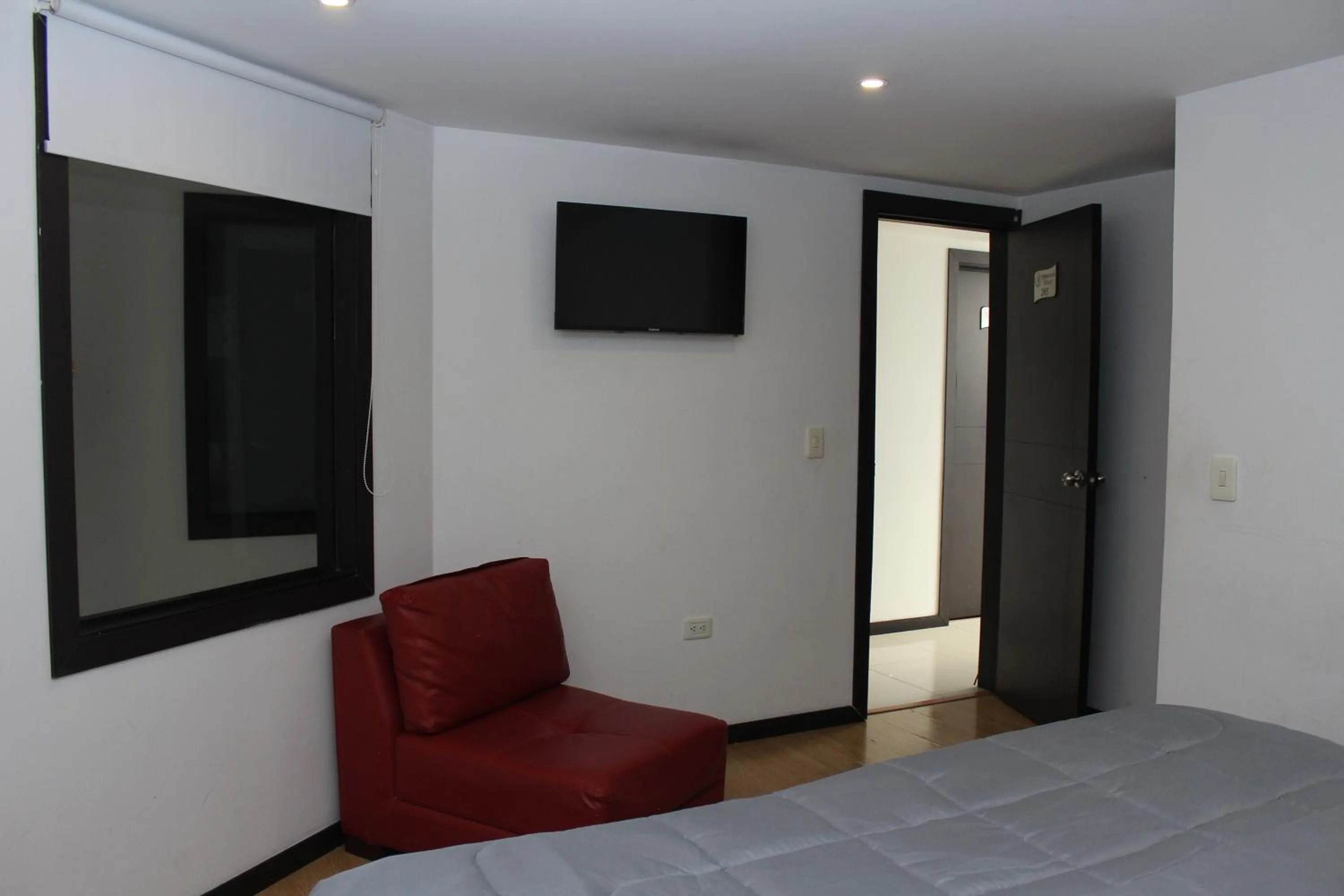 Photo of the whole room, Bed in Hotel Montecarlo Boutique