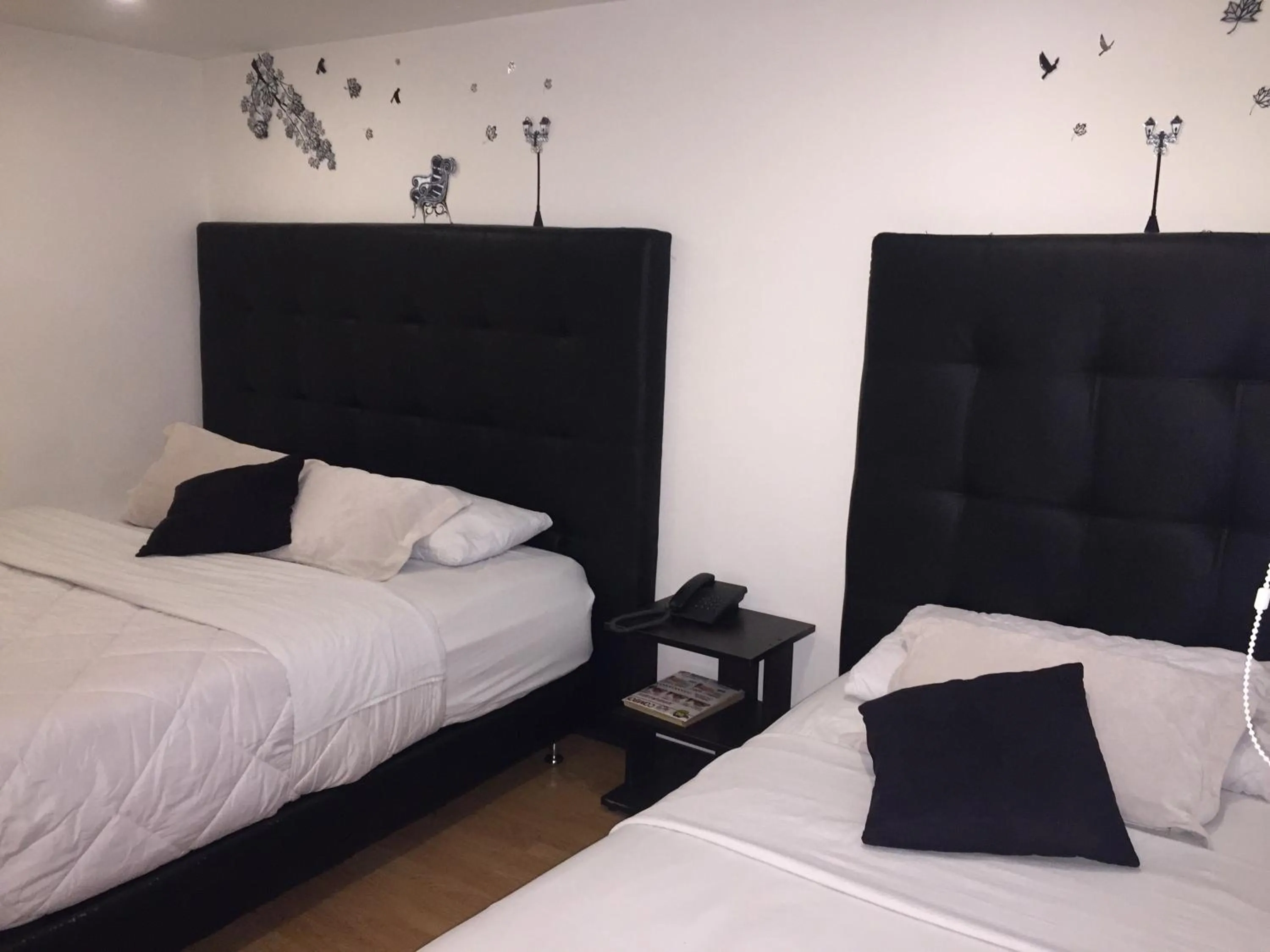 Bed in Hotel Montecarlo Boutique