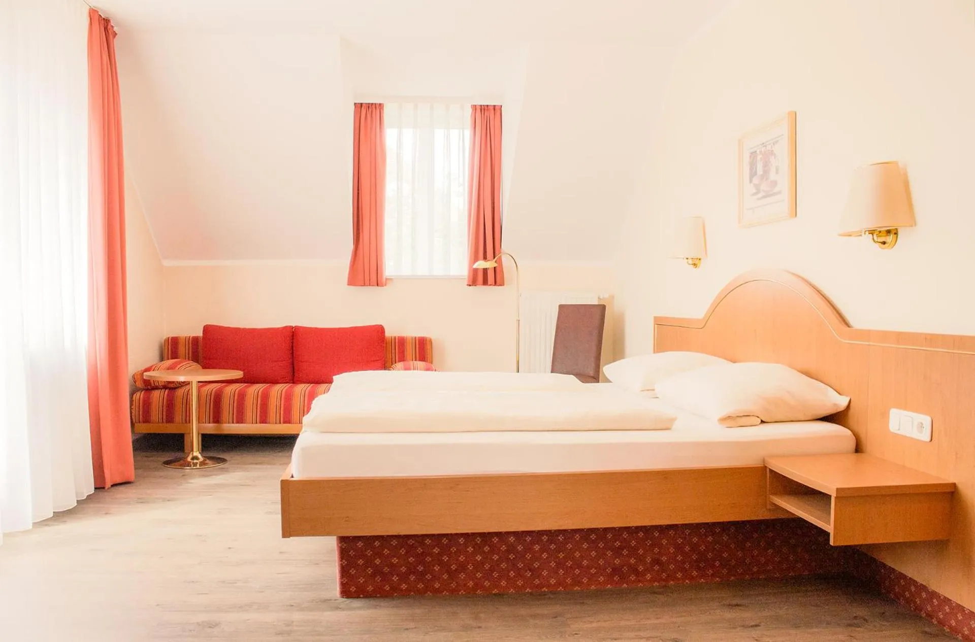 Bed in Hotel Kriemhild am Hirschgarten