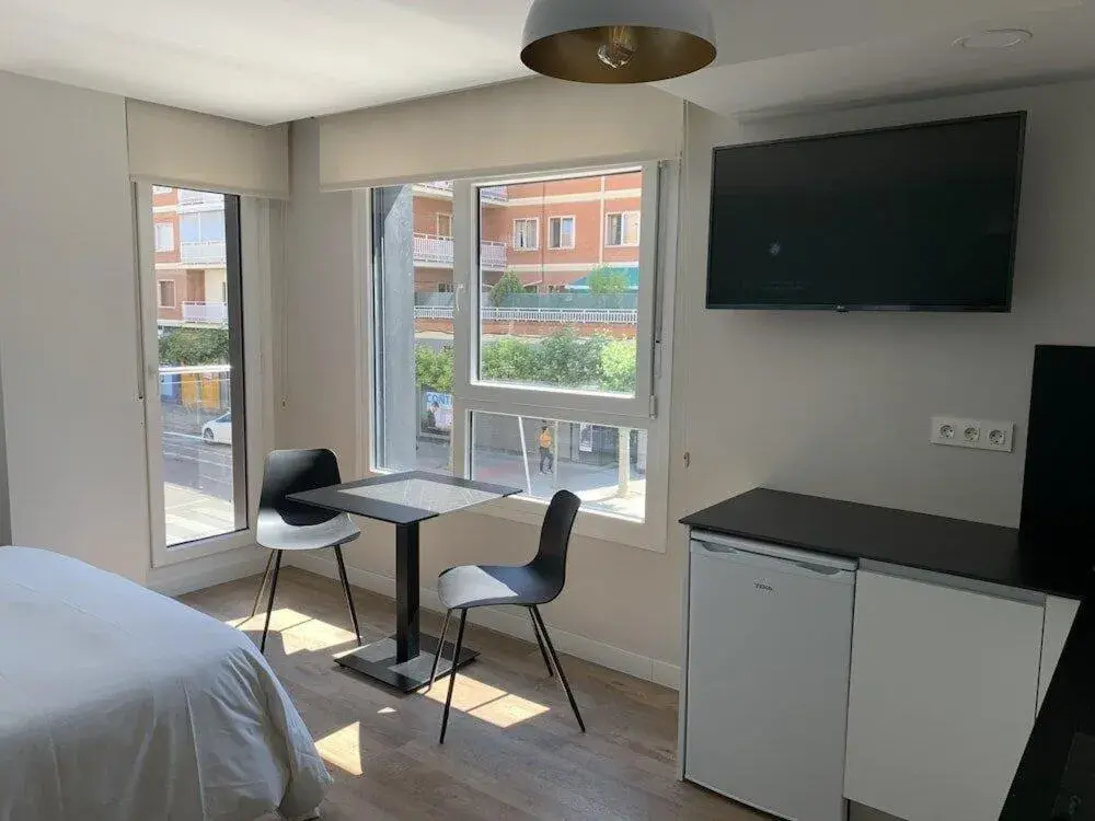 Dining area, Bed in Apartahotel Aranda Flex Living Dining area, Bed in Apartahotel Aranda Flex Living
