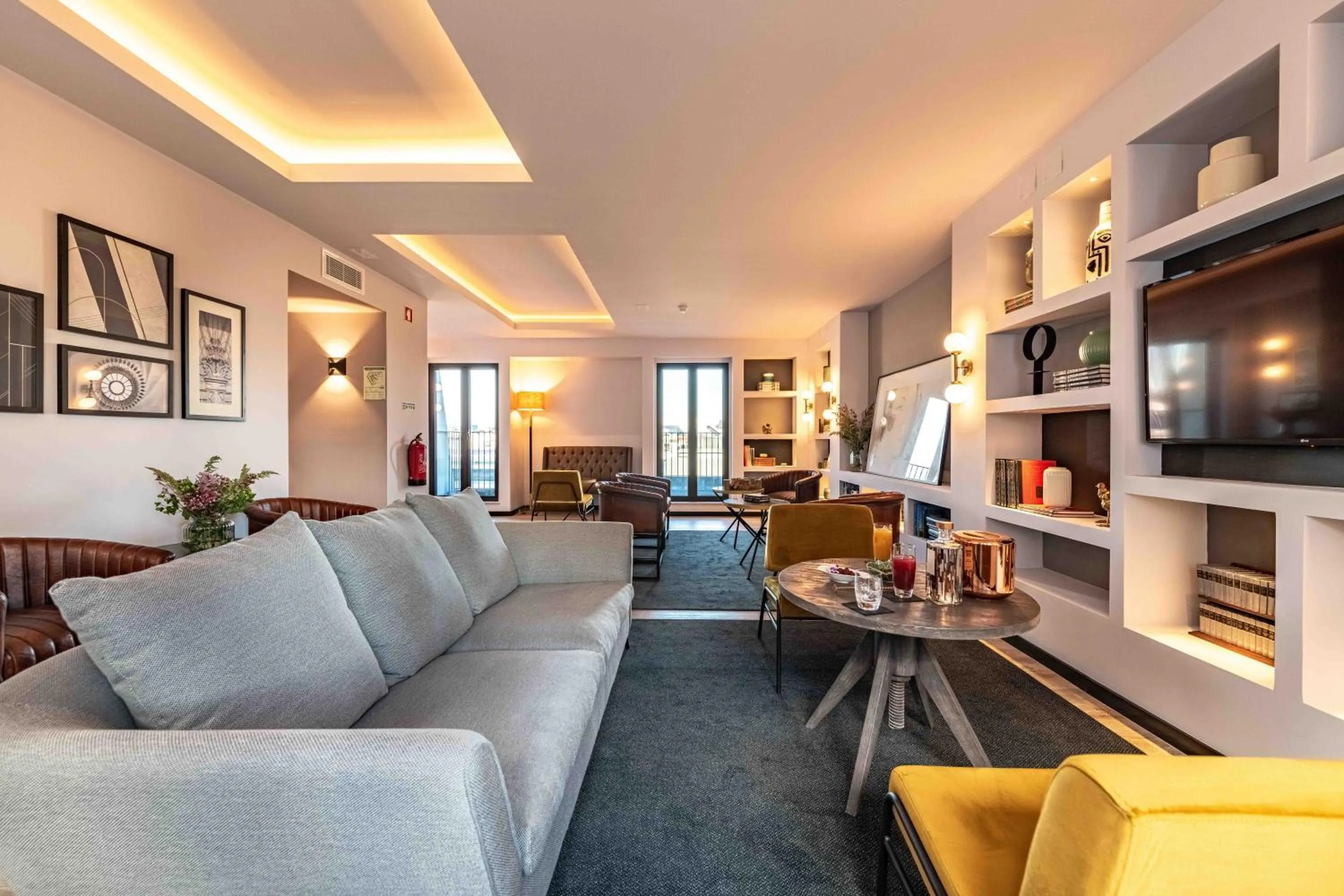 Communal lounge/ TV room in Pestana Lisboa Vintage City Center Suites