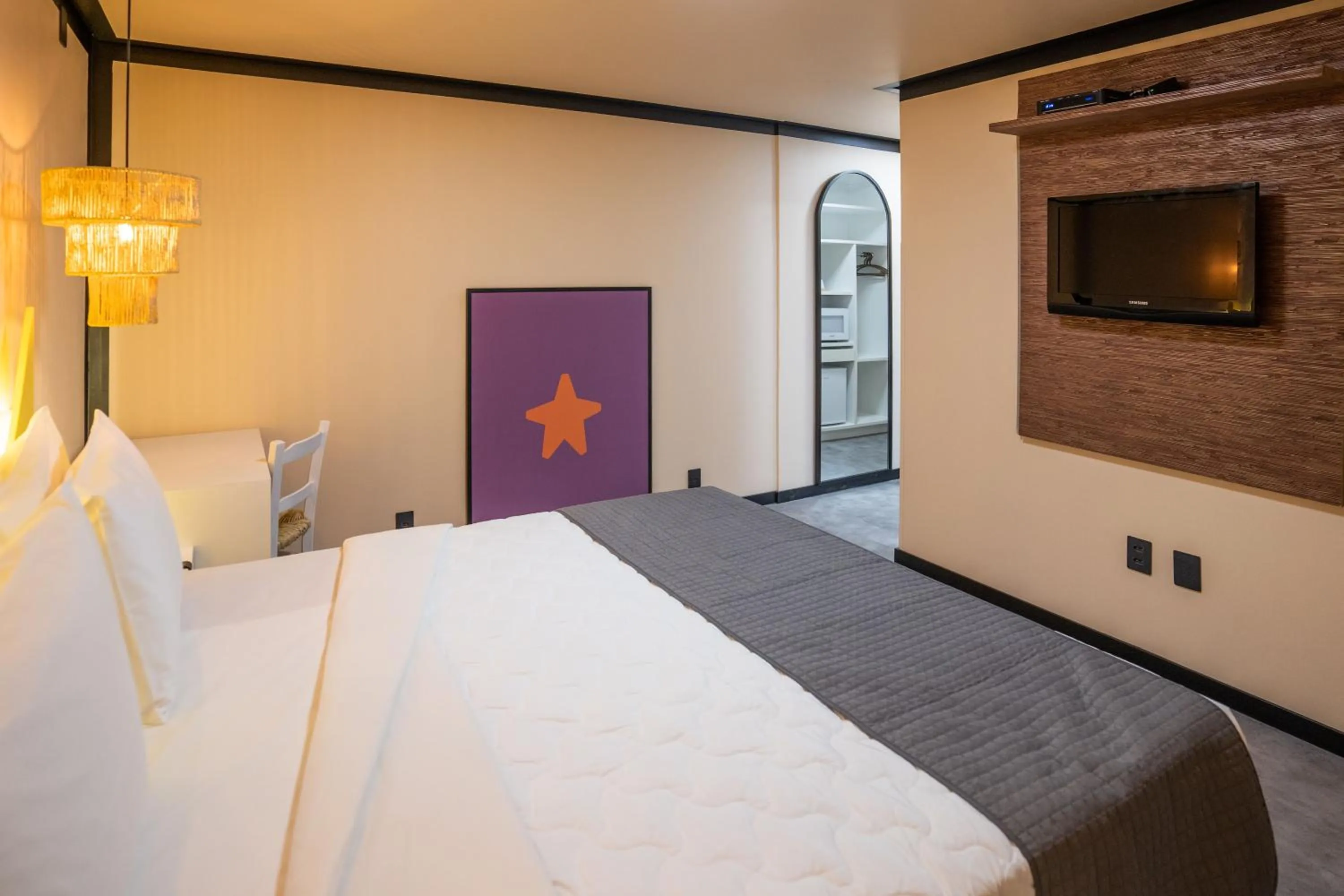 Bed in Bossa Jurerê Hotel