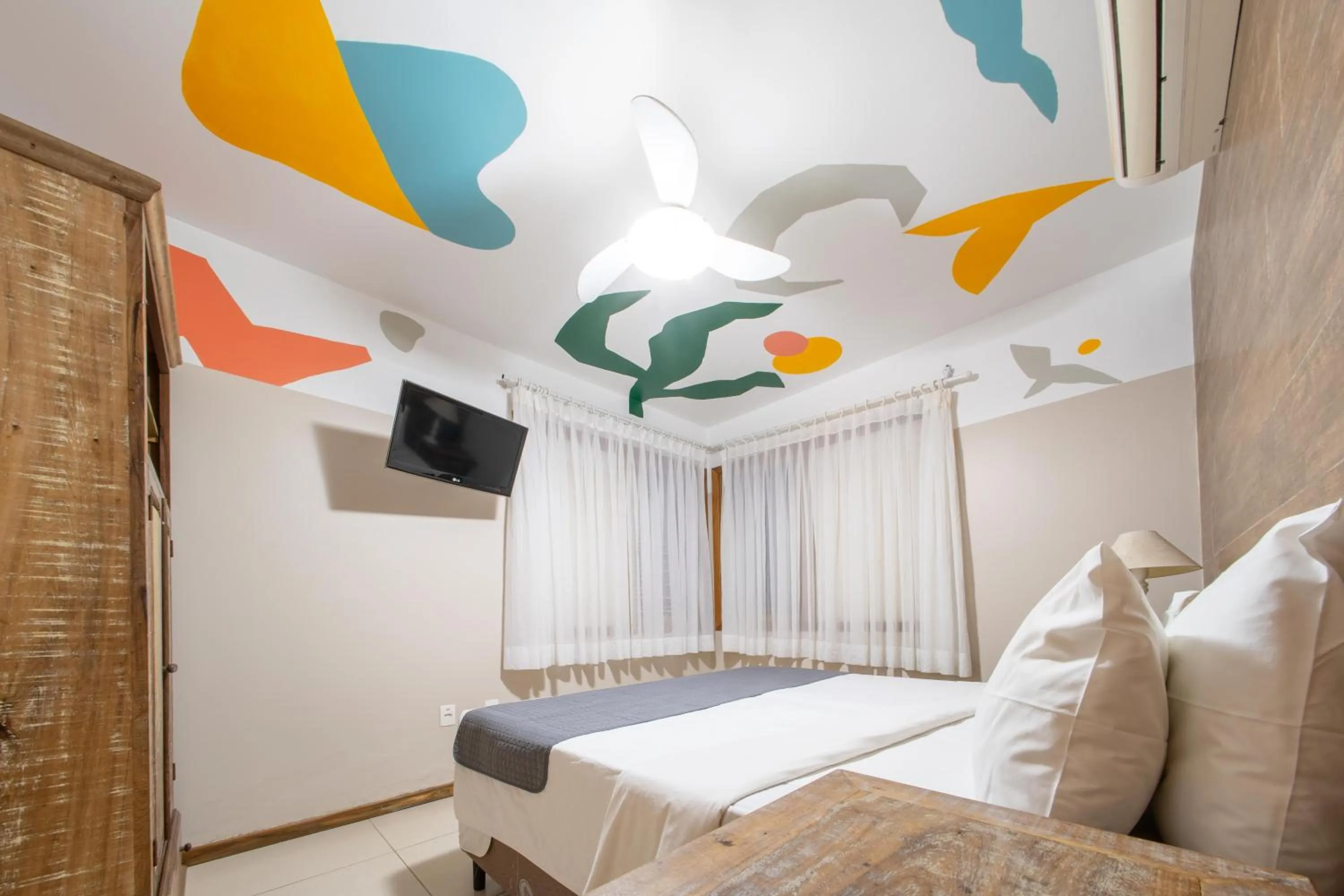 Bed in Bossa Jurerê Hotel