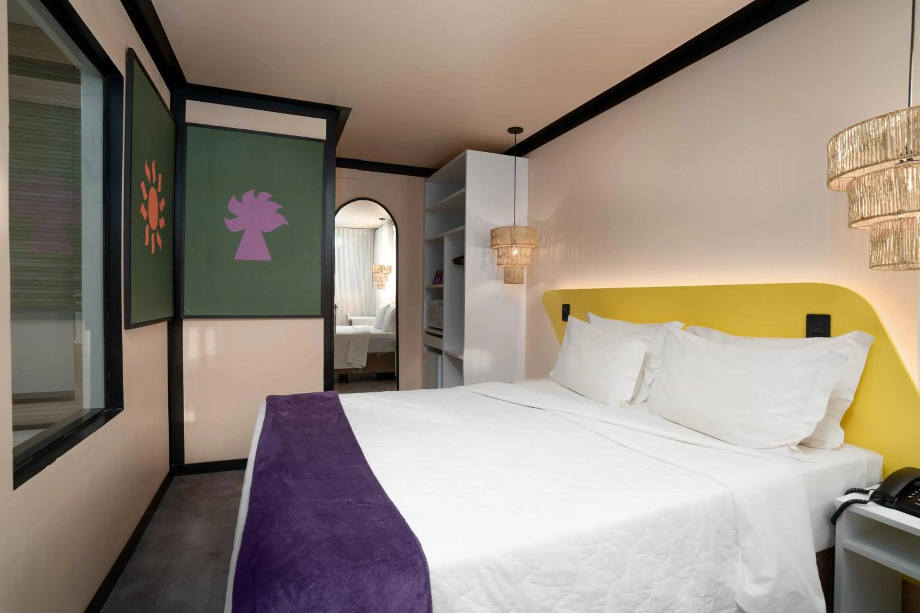 Bed in Bossa Jurerê Hotel