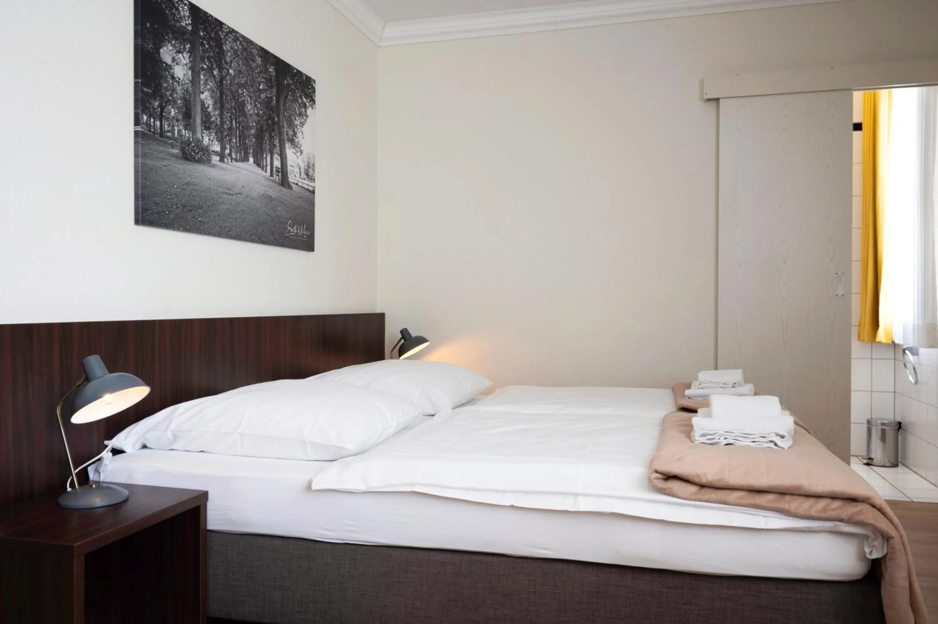 Bed in Hotel Mercedes City