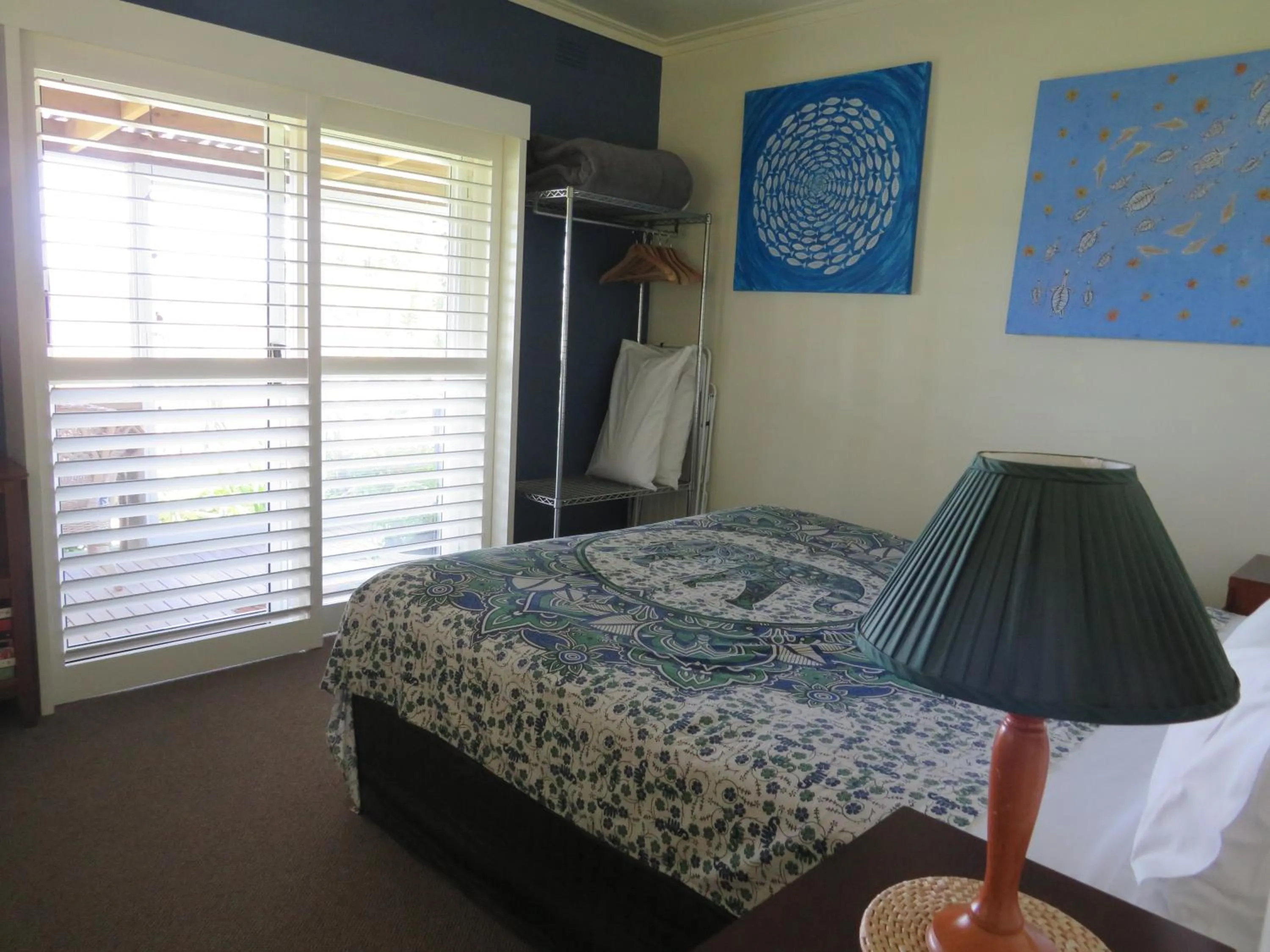 Bedroom, Bed in Lakes Entrance Waterfront Cottages with King Beds