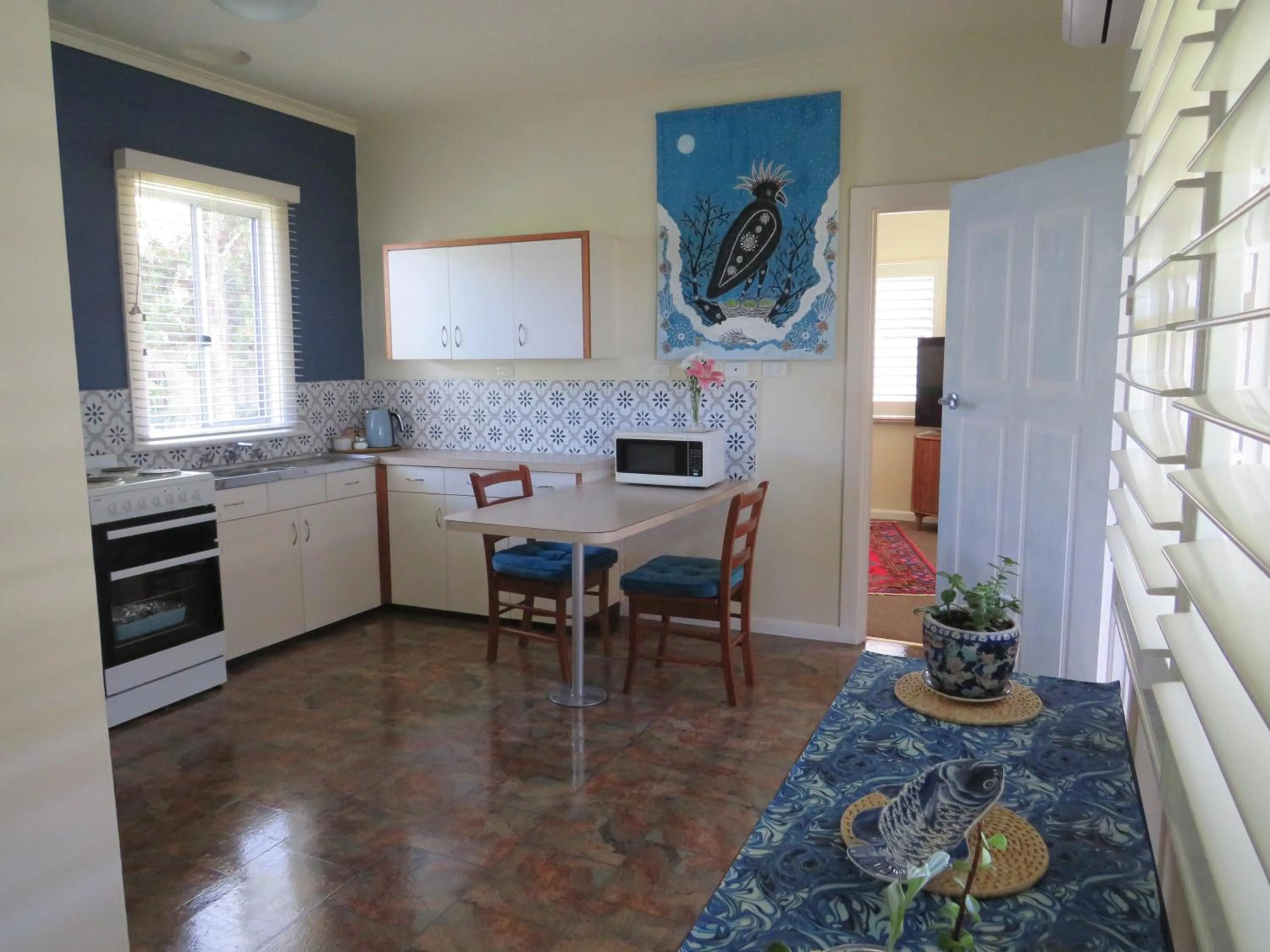 kitchen in Lakes Entrance Waterfront Cottages with King Beds