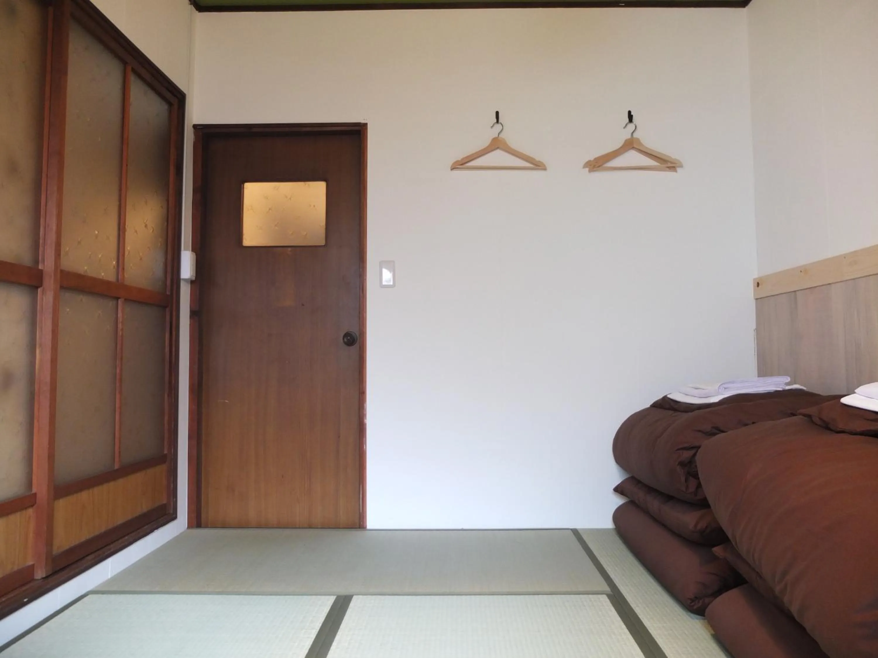 Photo of the whole room, Bed in YOMOGI GUESTHOUSE