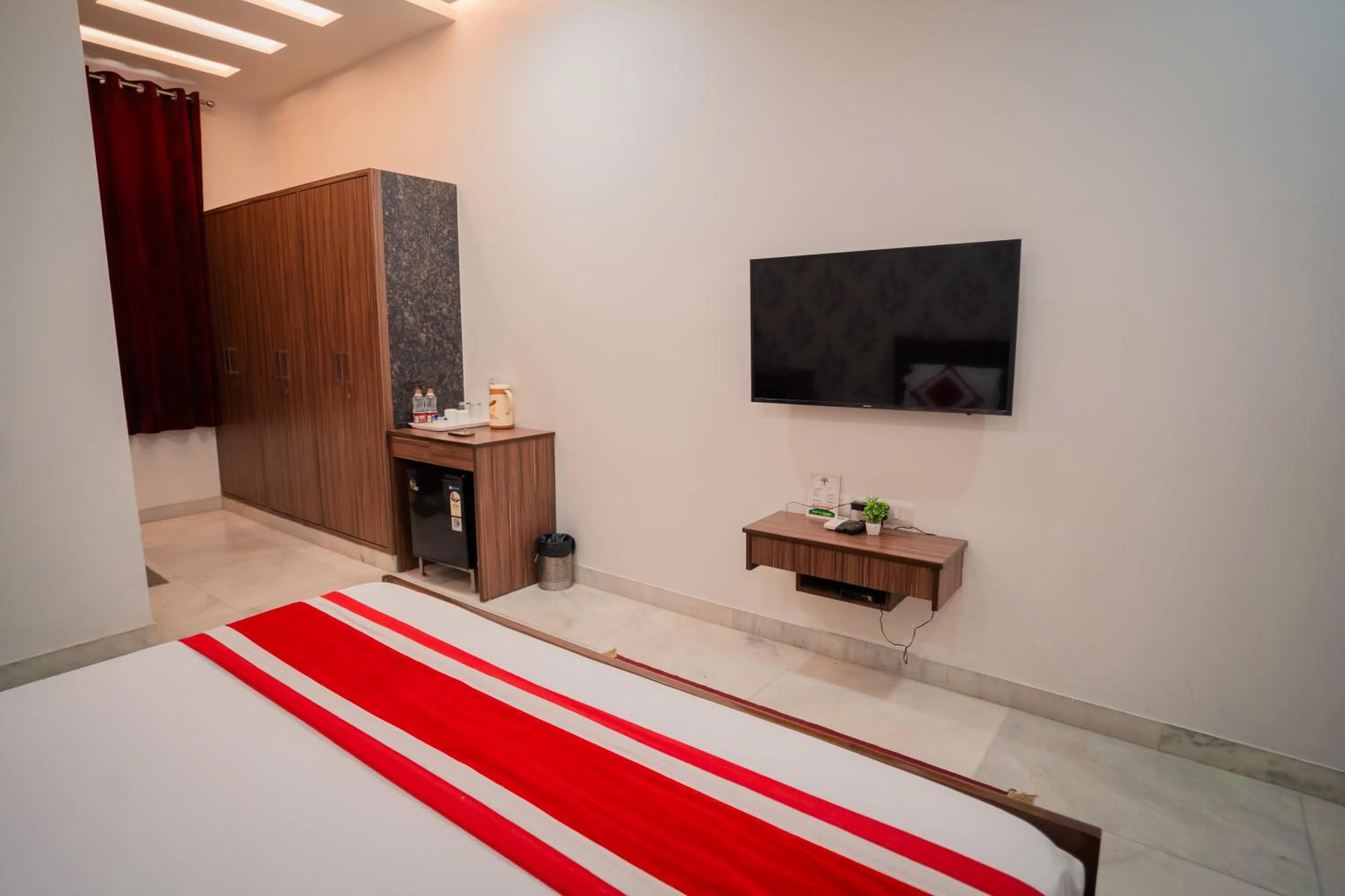 Bed in Peepal Tree Residency