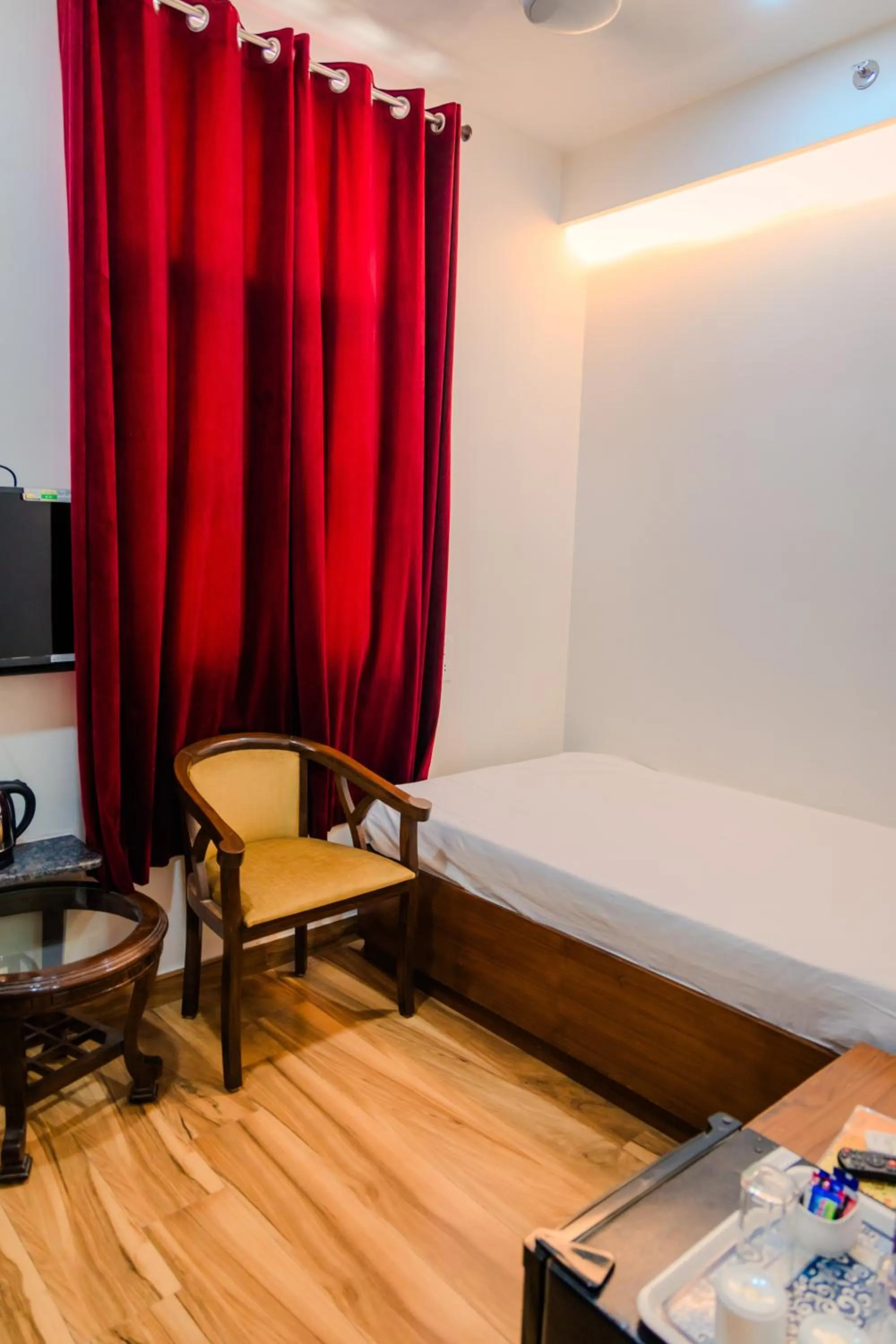 Bed in Peepal Tree Residency