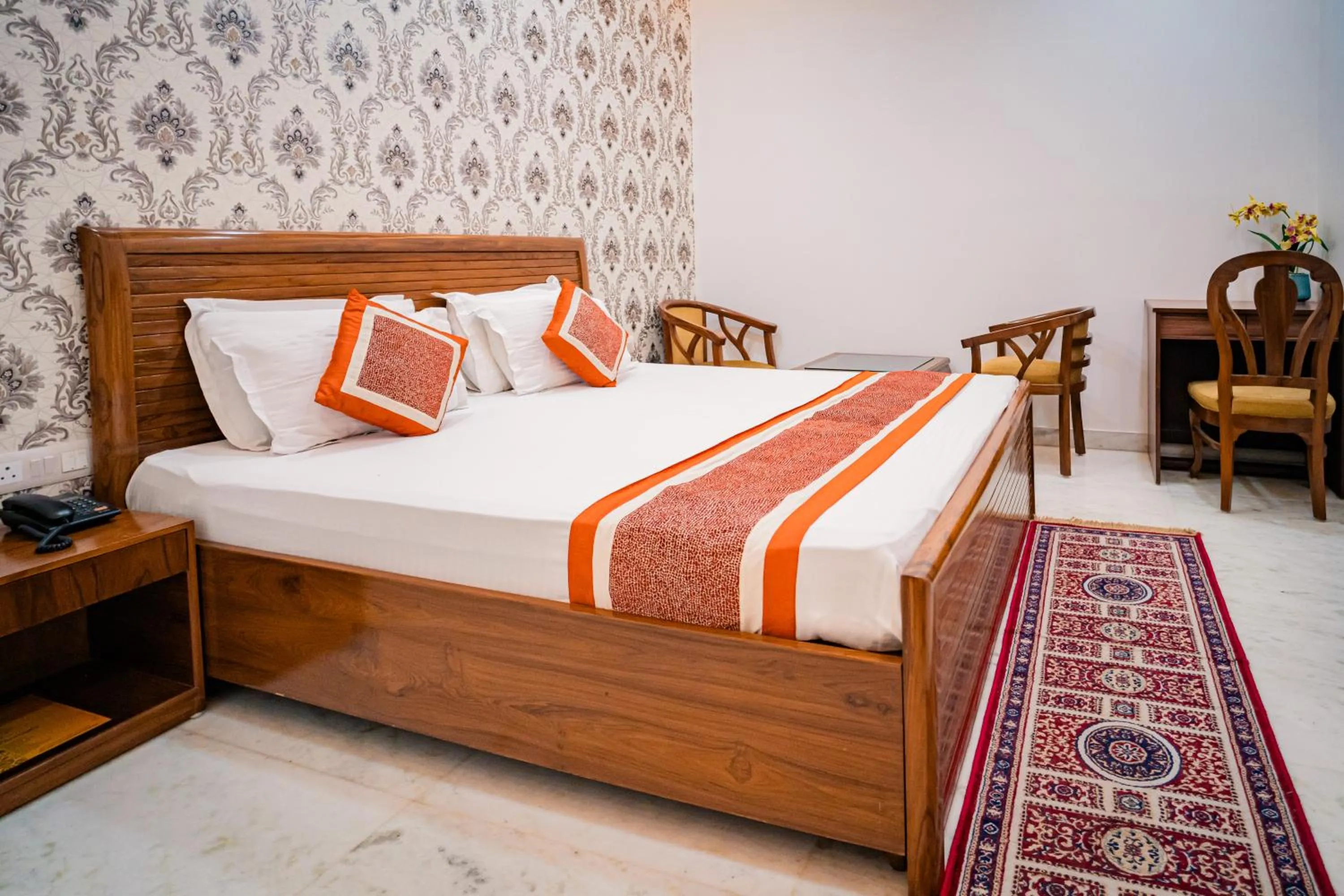 Bed in Peepal Tree Residency