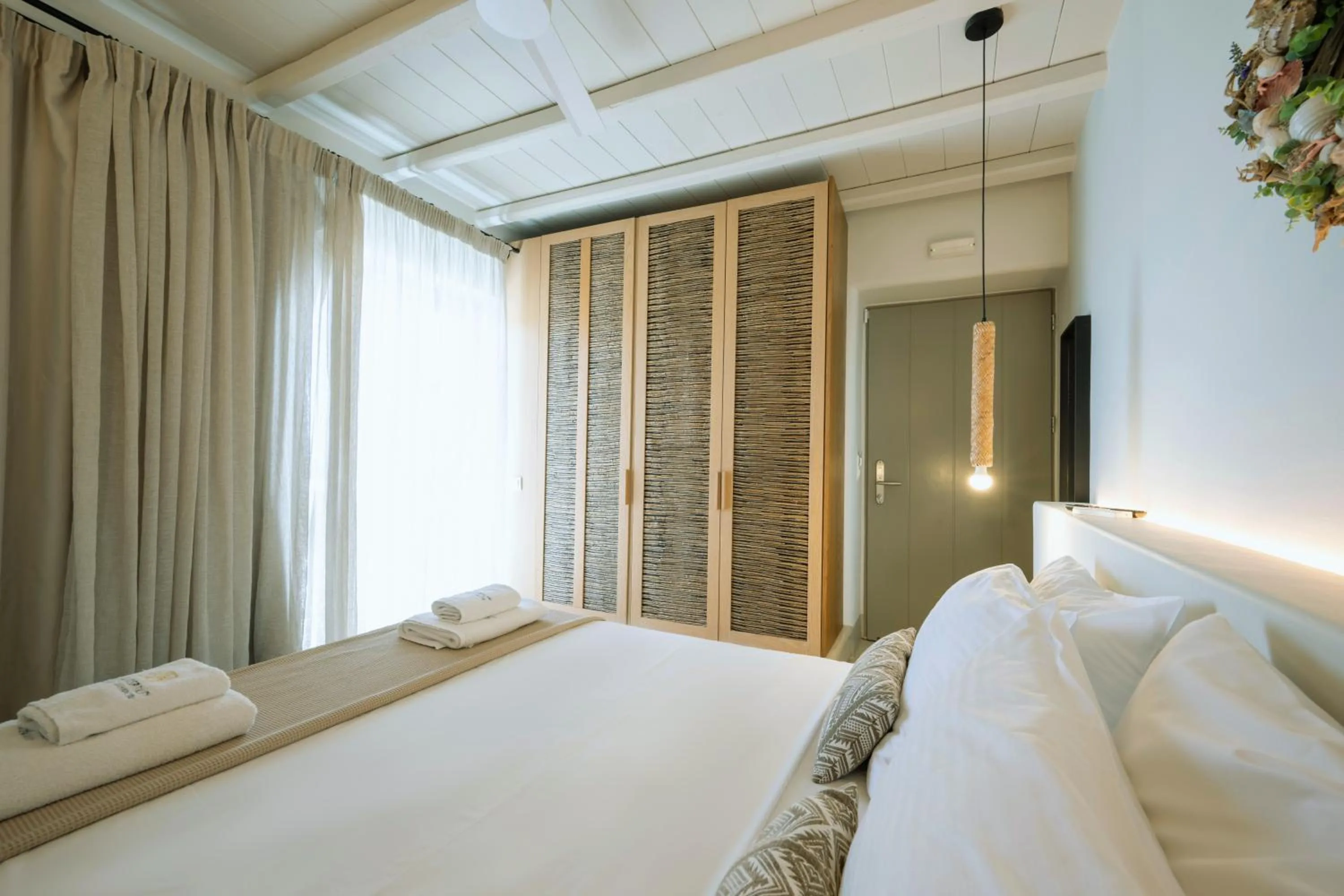 Bed in Aegean Hospitality